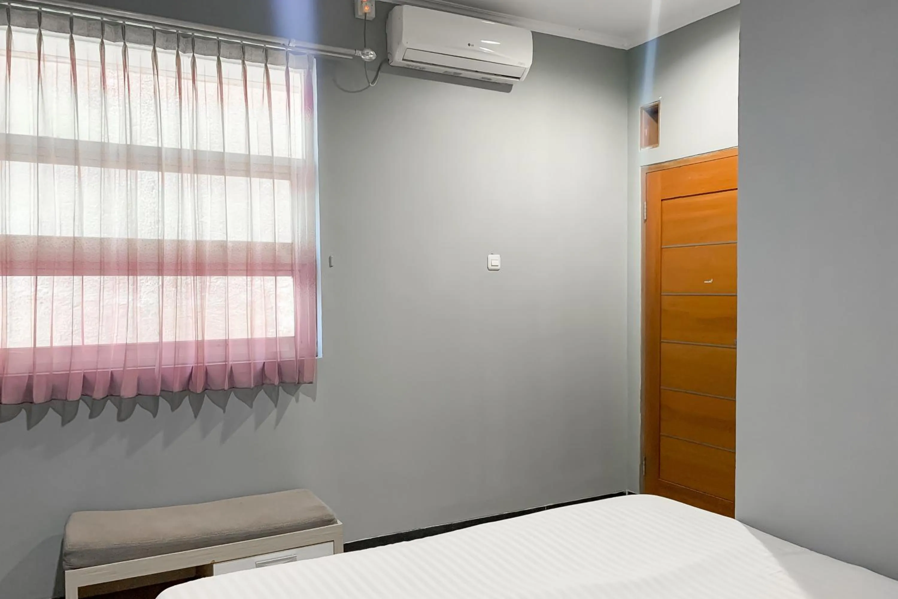 Bedroom, Bed in Karins Guesthouse Syariah RedPartner