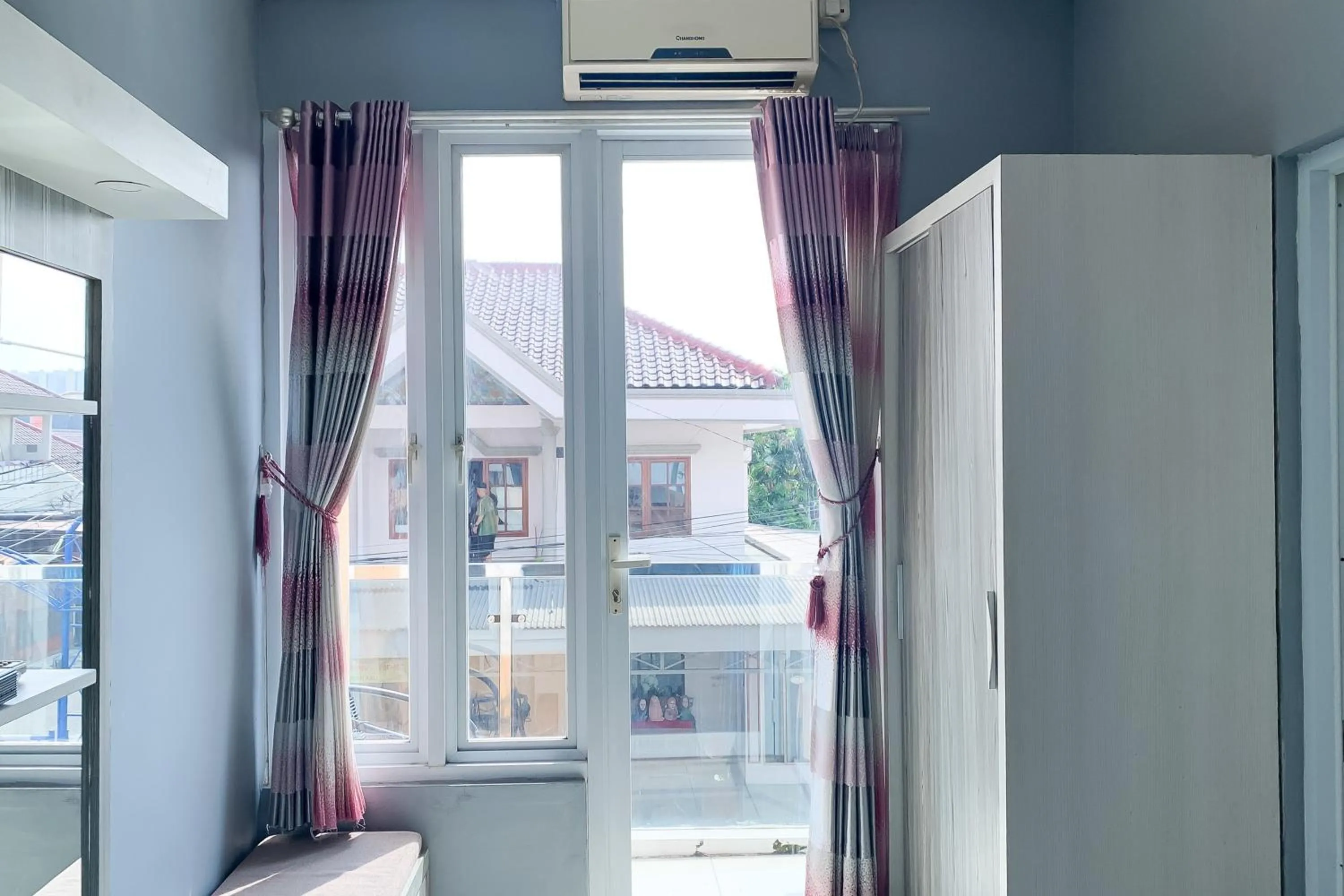 Bedroom in Karins Guesthouse Syariah RedPartner