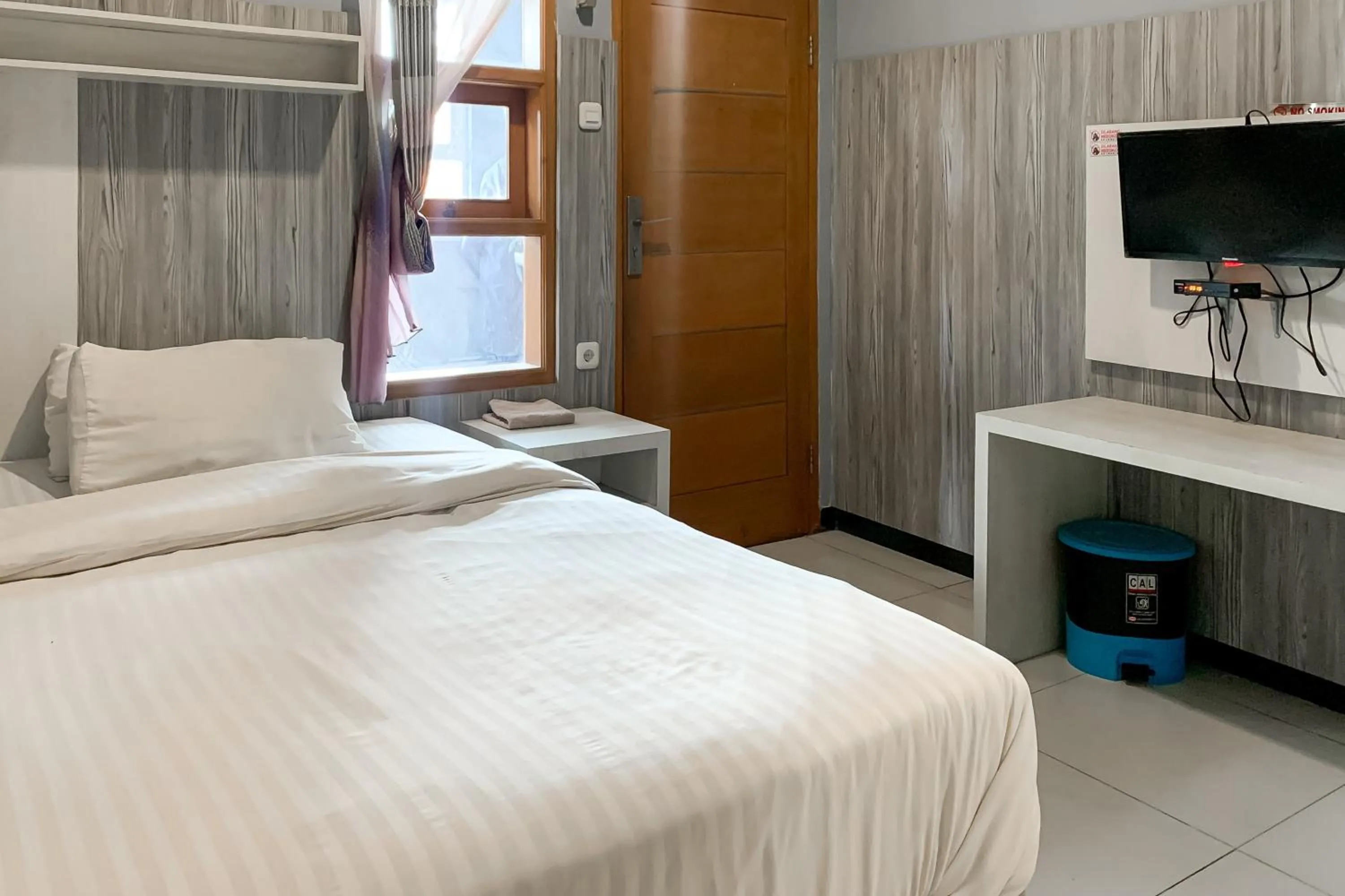 Bedroom, Bed in Karins Guesthouse Syariah RedPartner