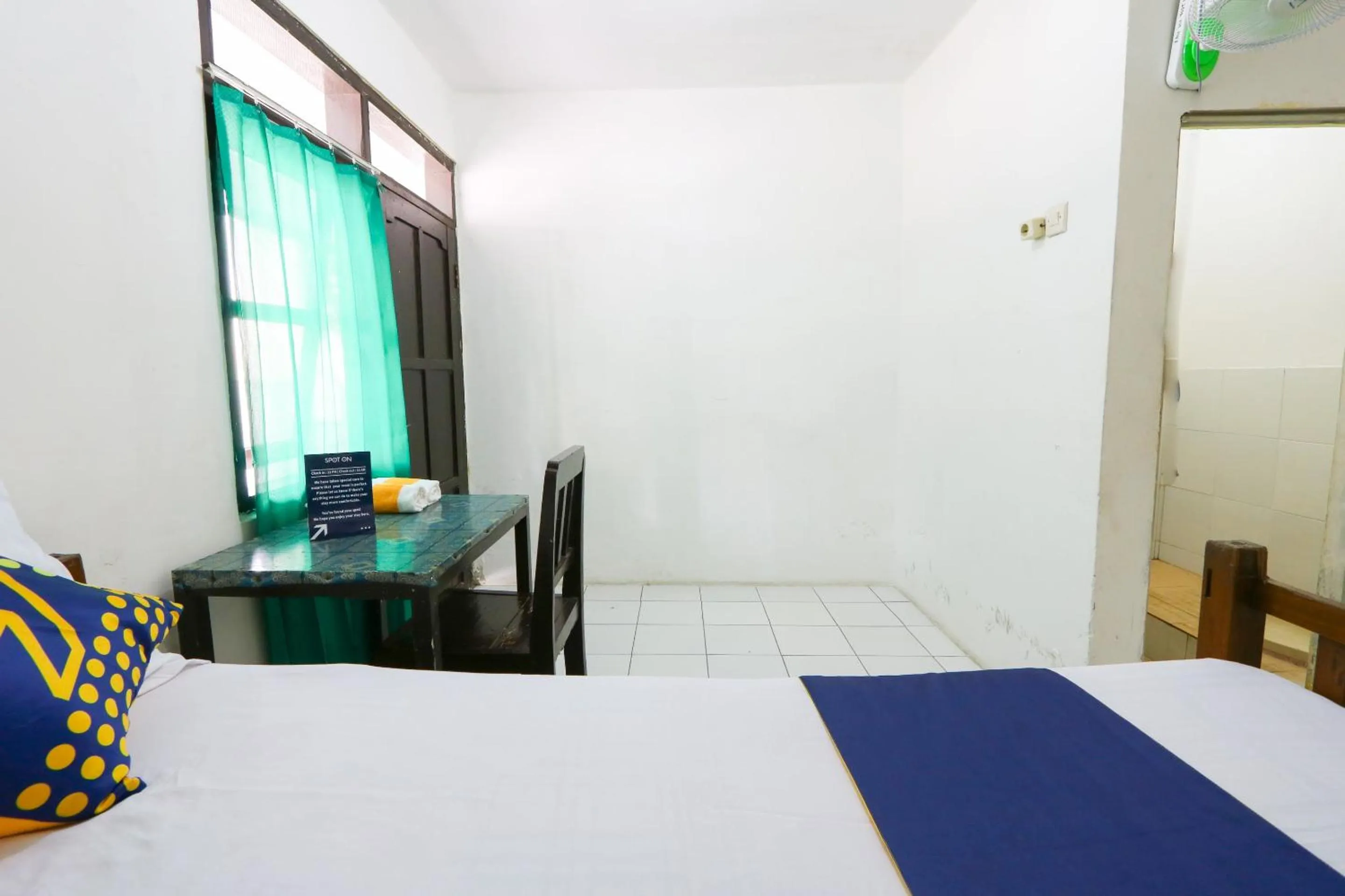 Bedroom in SPOT ON 2422 Hotel Moga Sari