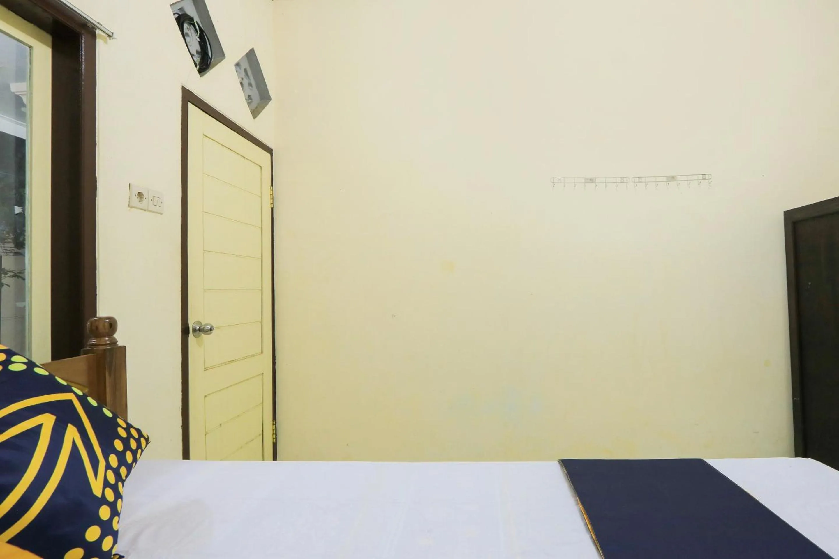 Bedroom, Bed in OYO 2371 Islami Family Residence