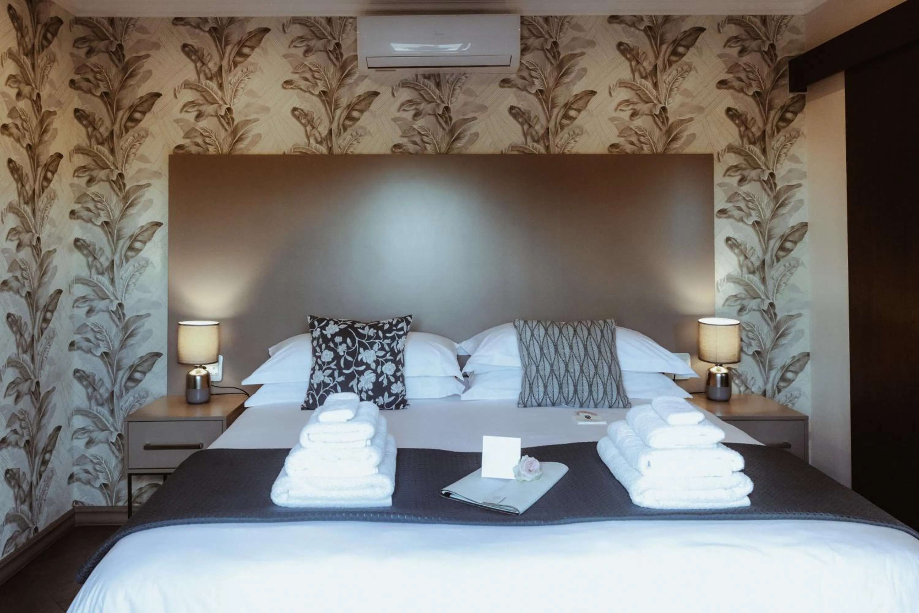 Bed in The Feather Hill Boutique Hotel