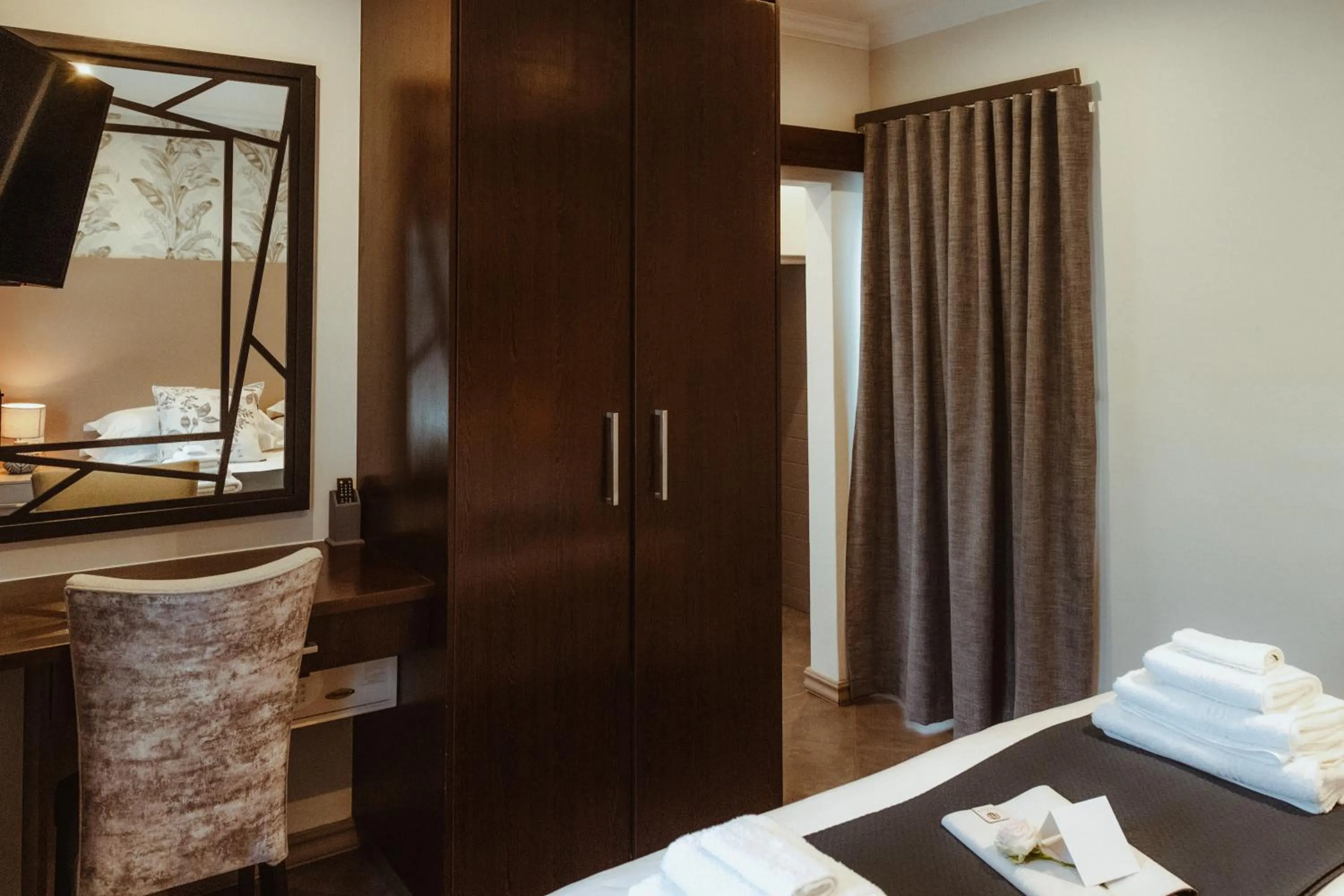 Bed in The Feather Hill Boutique Hotel