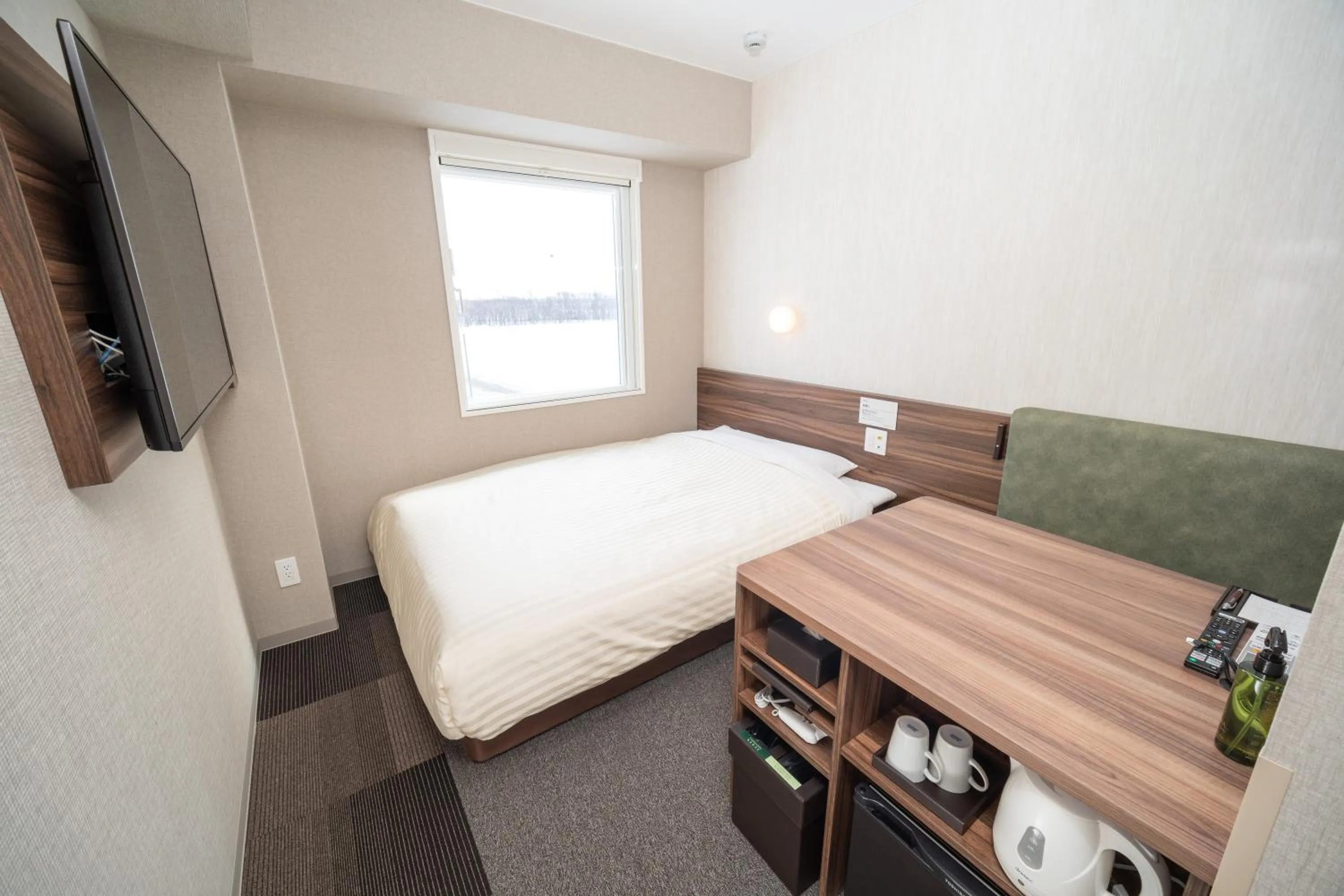 Bedroom in Super Hotel Ishikari