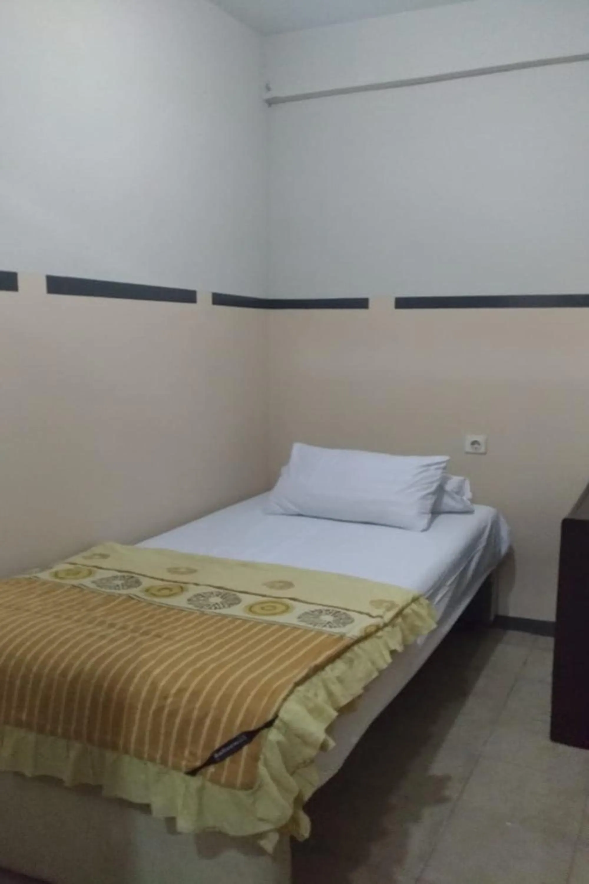 Bed in Kamarku Apartment at The Edge