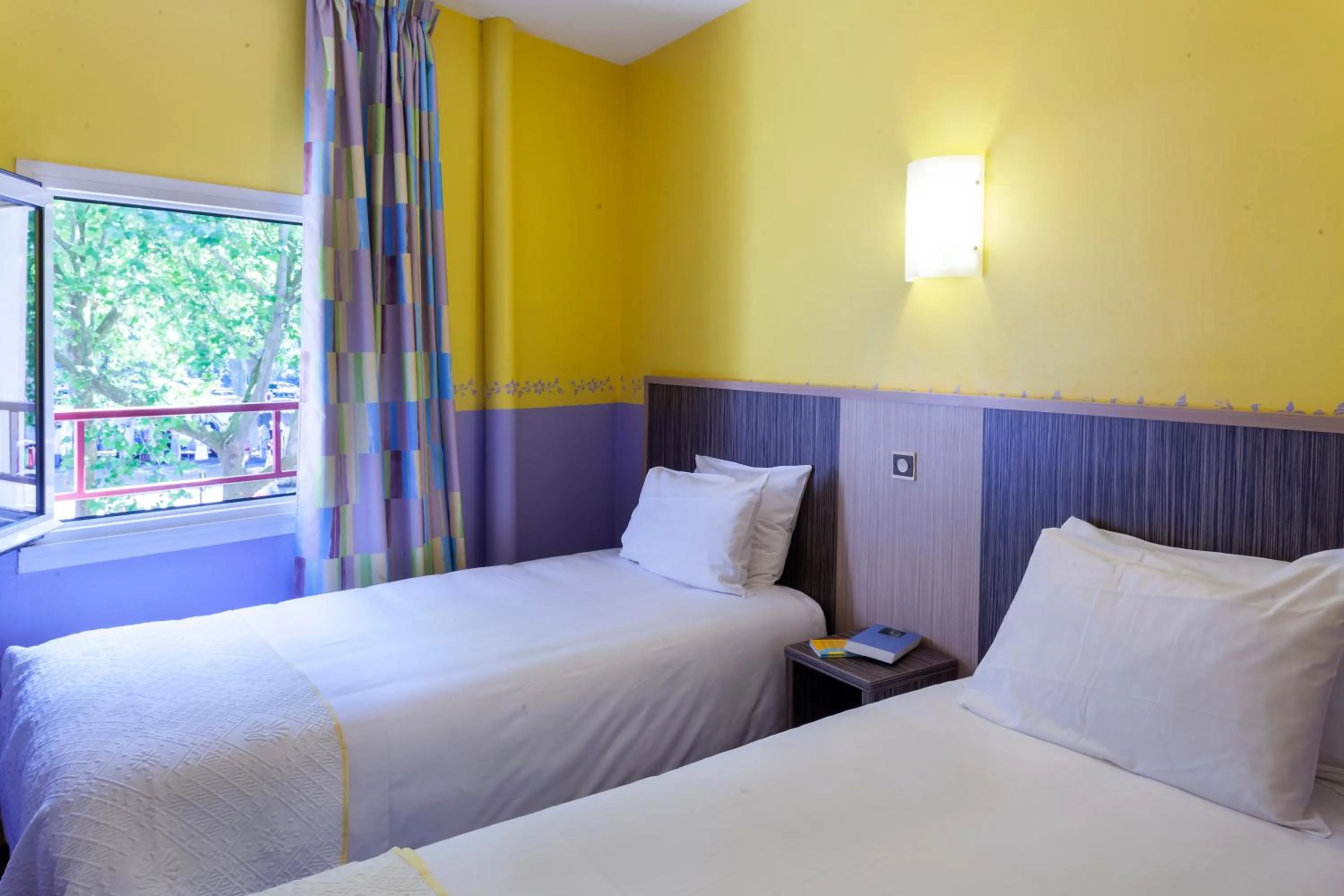 Photo of the whole room, Bed in BRIT HOTEL Le Lion d'Or CHINON