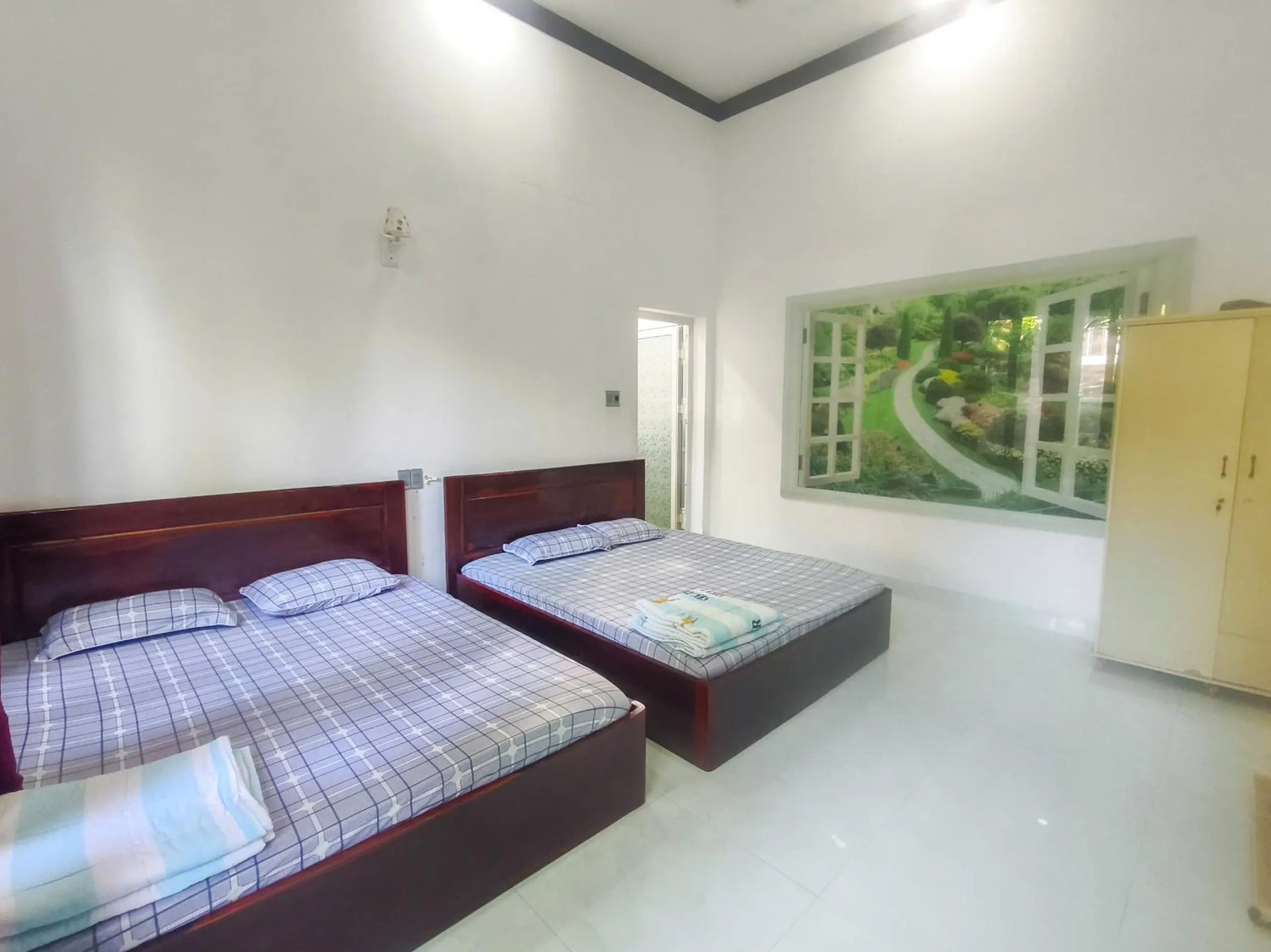 Bed in Nhà Nghỉ THẢO NGUYÊN XANH