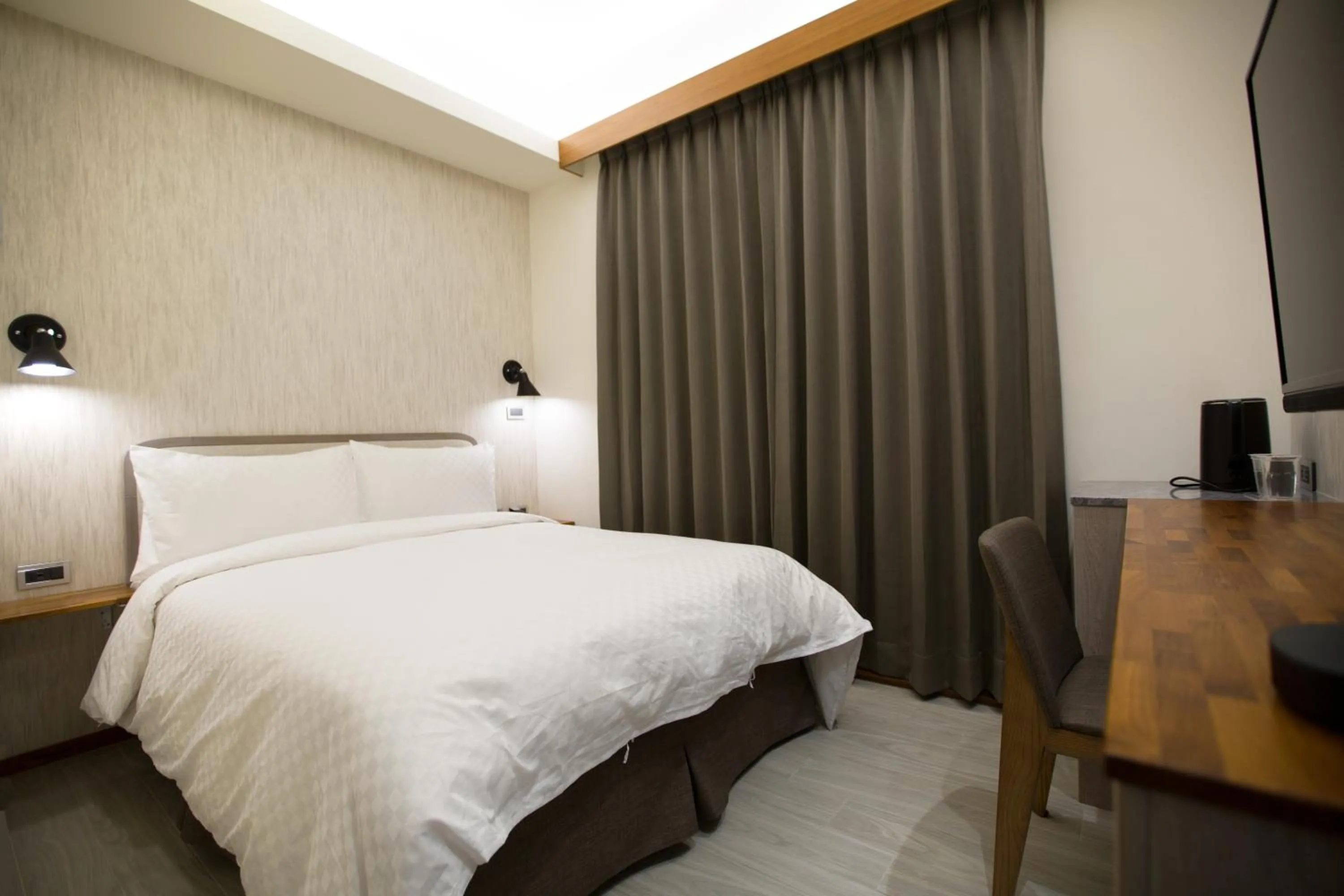 Bed in 原鄉商旅 Yuan Hsiang Hotel