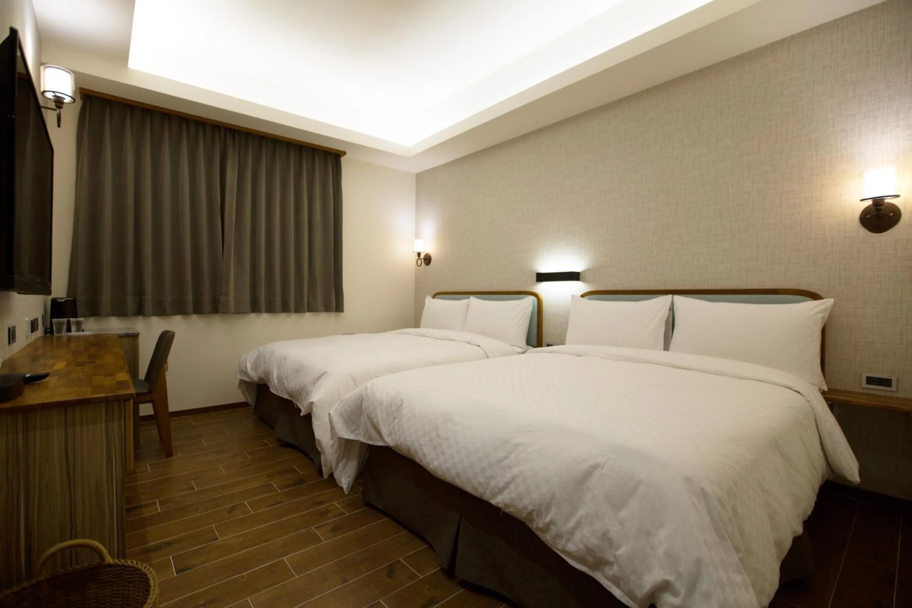 Bed in 原鄉商旅 Yuan Hsiang Hotel