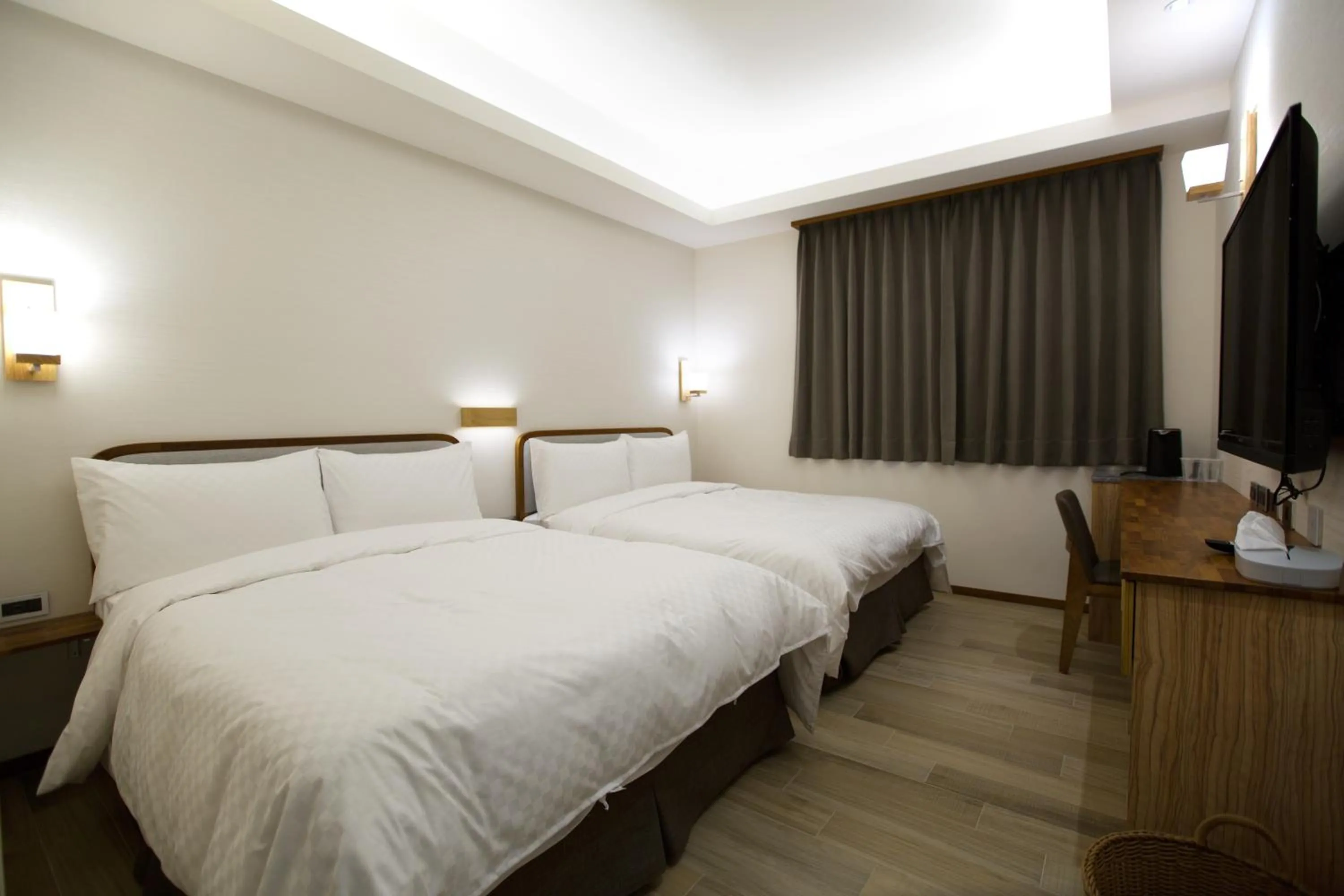 Bed in 原鄉商旅 Yuan Hsiang Hotel