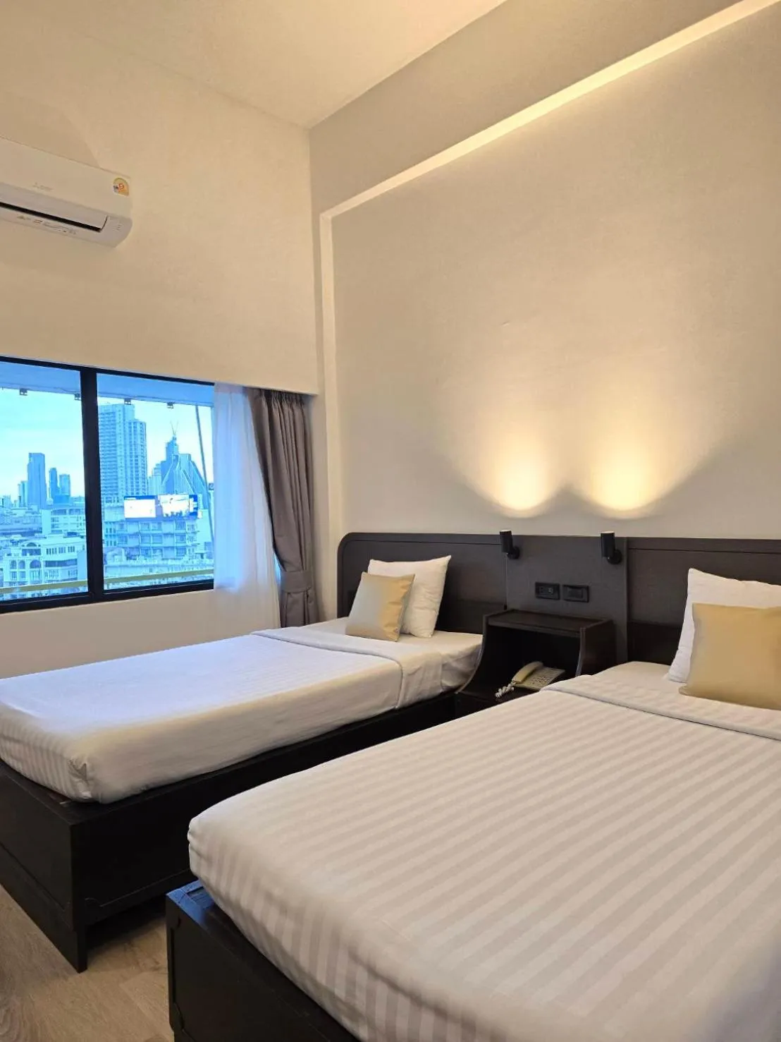 Bed in The Krungkasem Srikrung Hotel