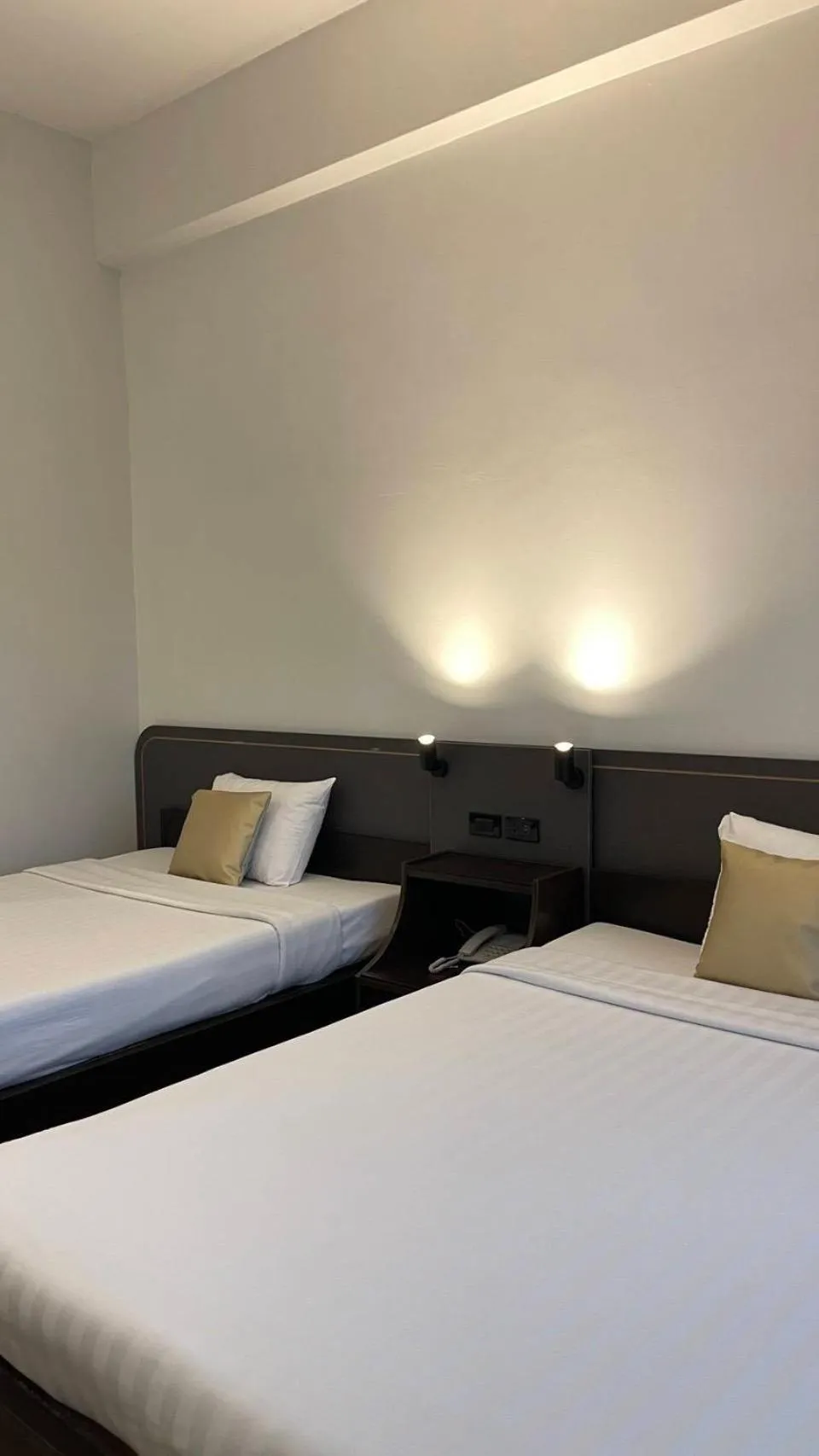 Bed in The Krungkasem Srikrung Hotel