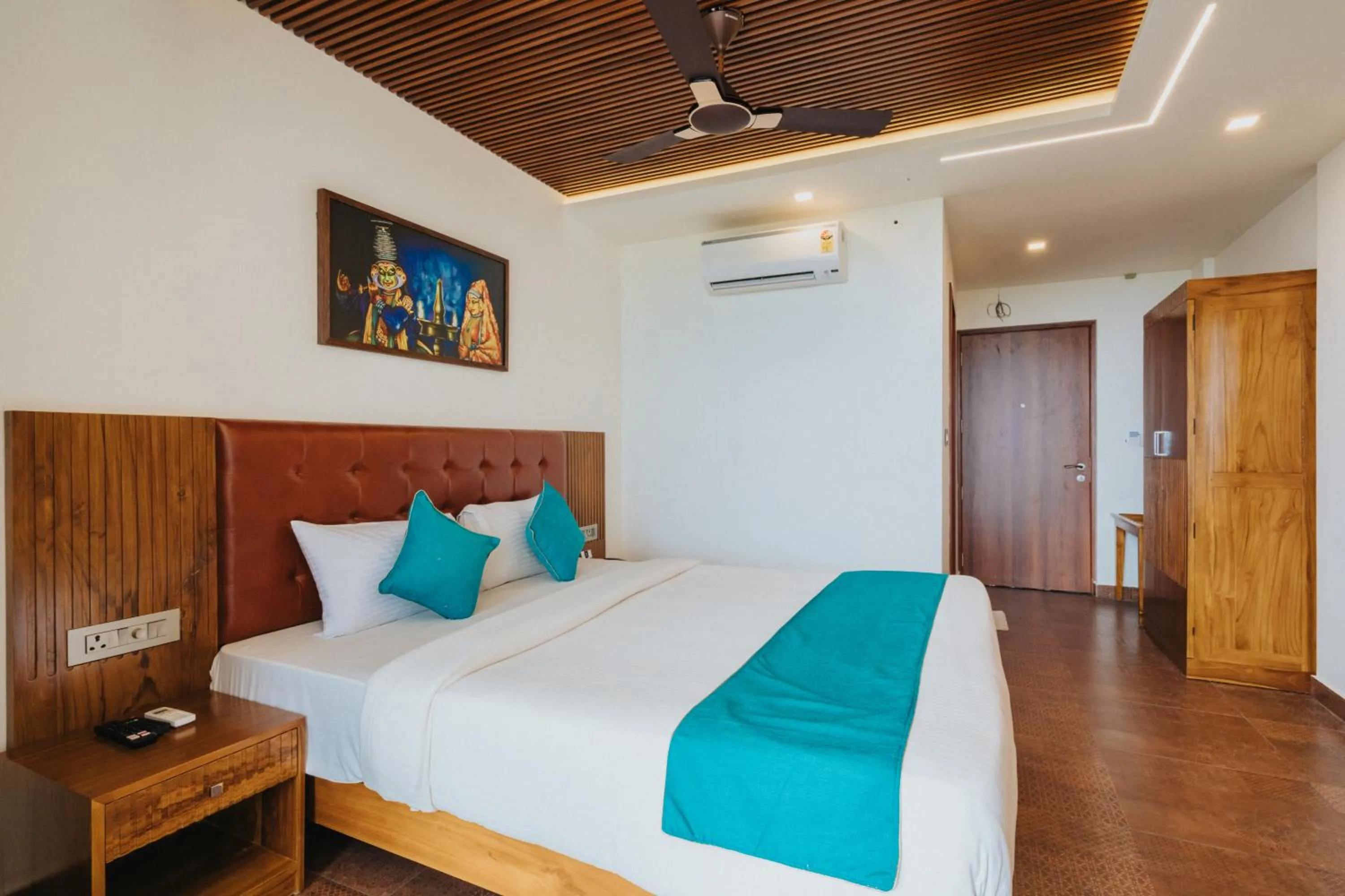 Bed in Aadisaktthi Leisure Resort, Kovalam