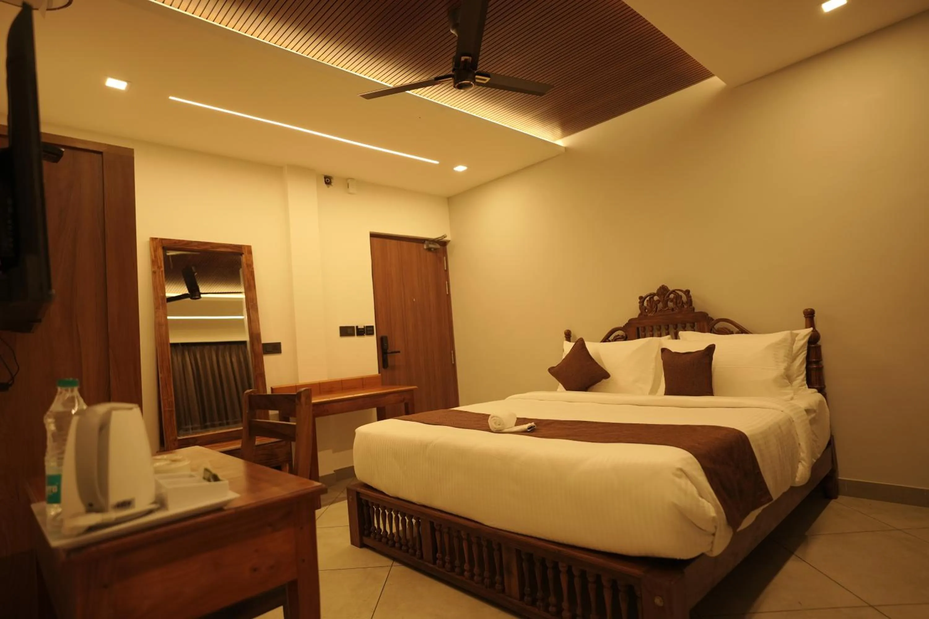Bed in Aadisaktthi Leisure Resort, Kovalam