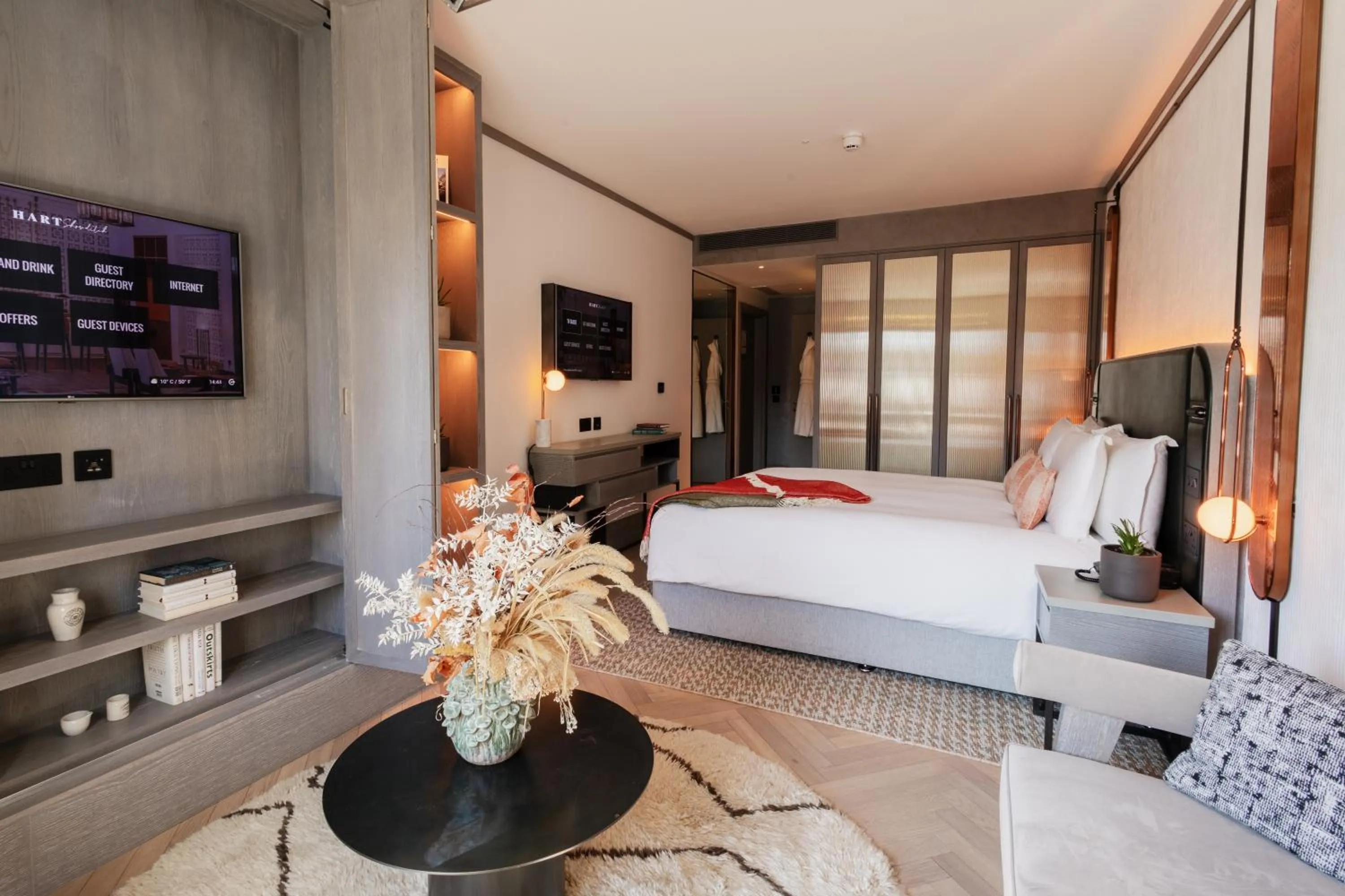 Seating area, Bed in Hart Shoreditch Hotel London, Curio Collection by Hilton