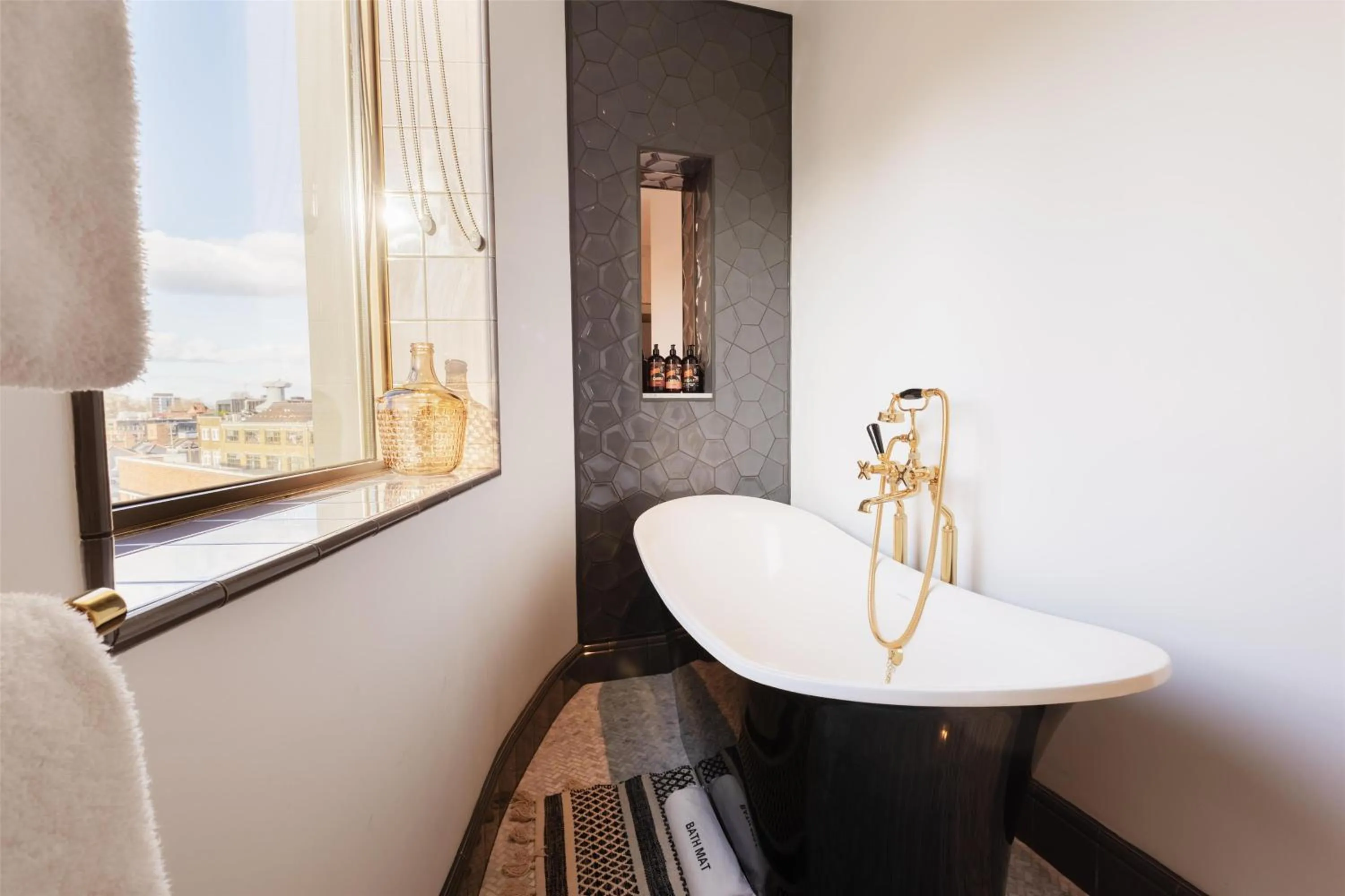 Bathroom in Hart Shoreditch Hotel London, Curio Collection by Hilton