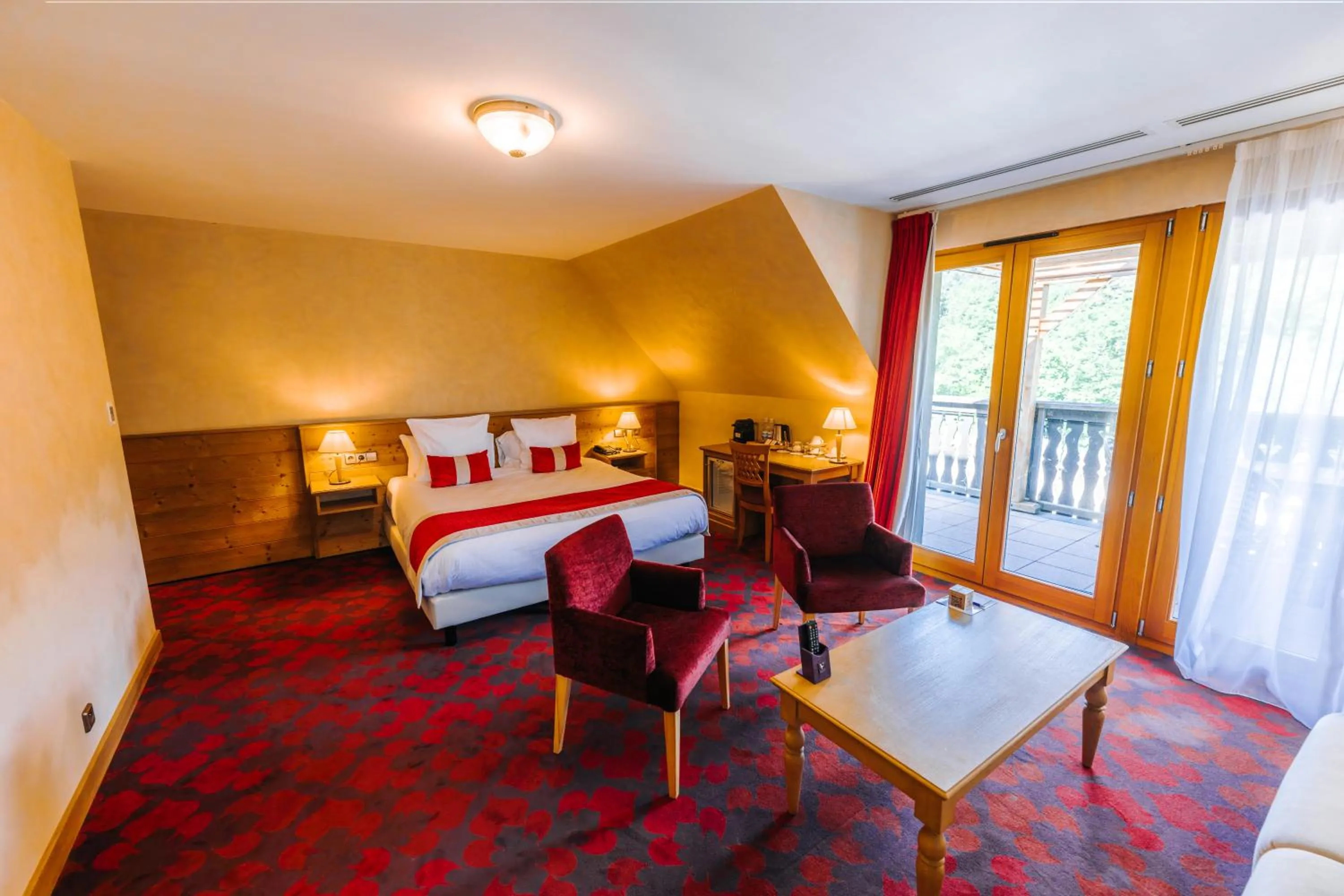 Bed in Les Violettes Hotel & Spa