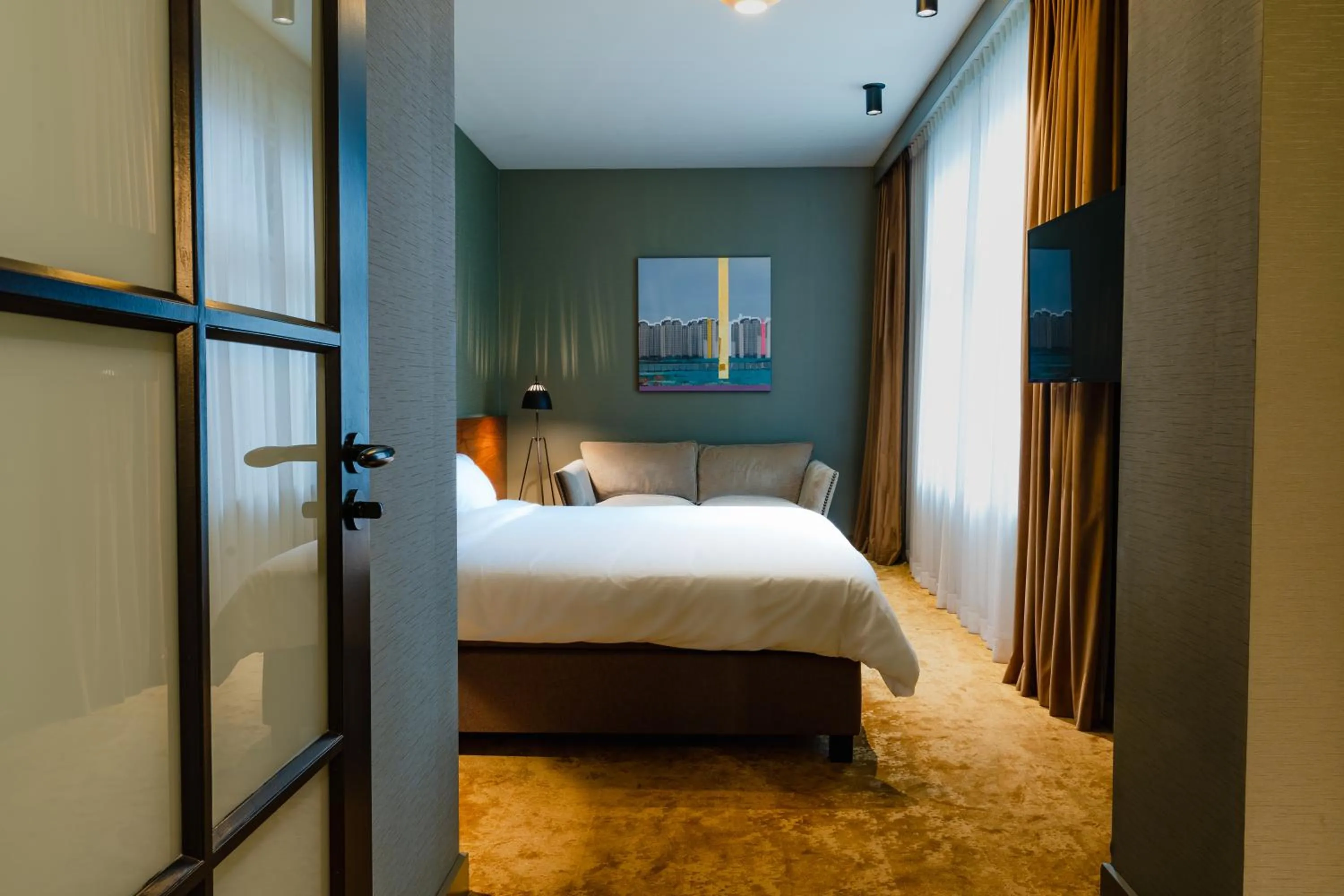 Seating area, Bed in Hotel Mai Amsterdam