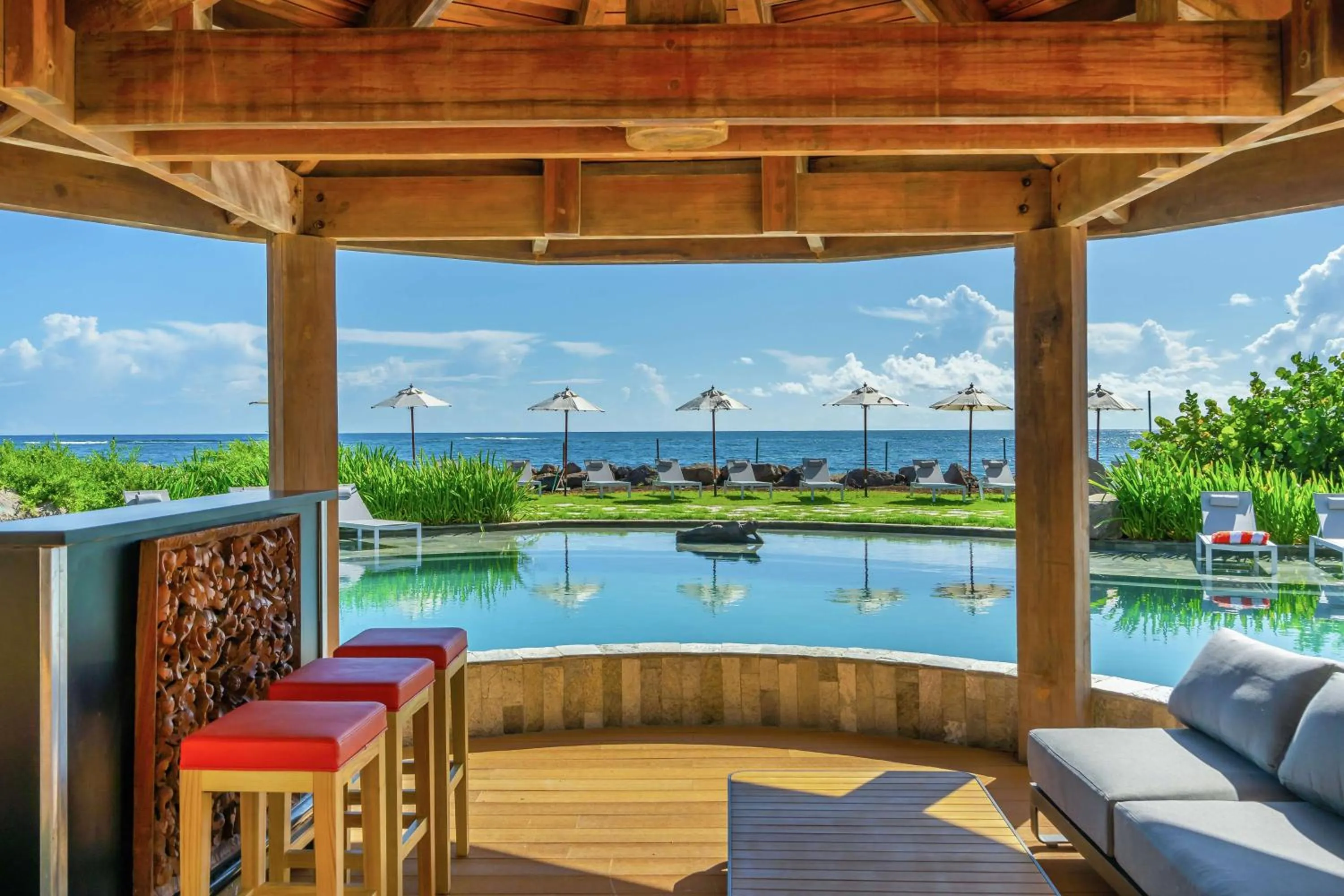 Pool view in Koi Resort Saint Kitts, Curio Collection by Hilton