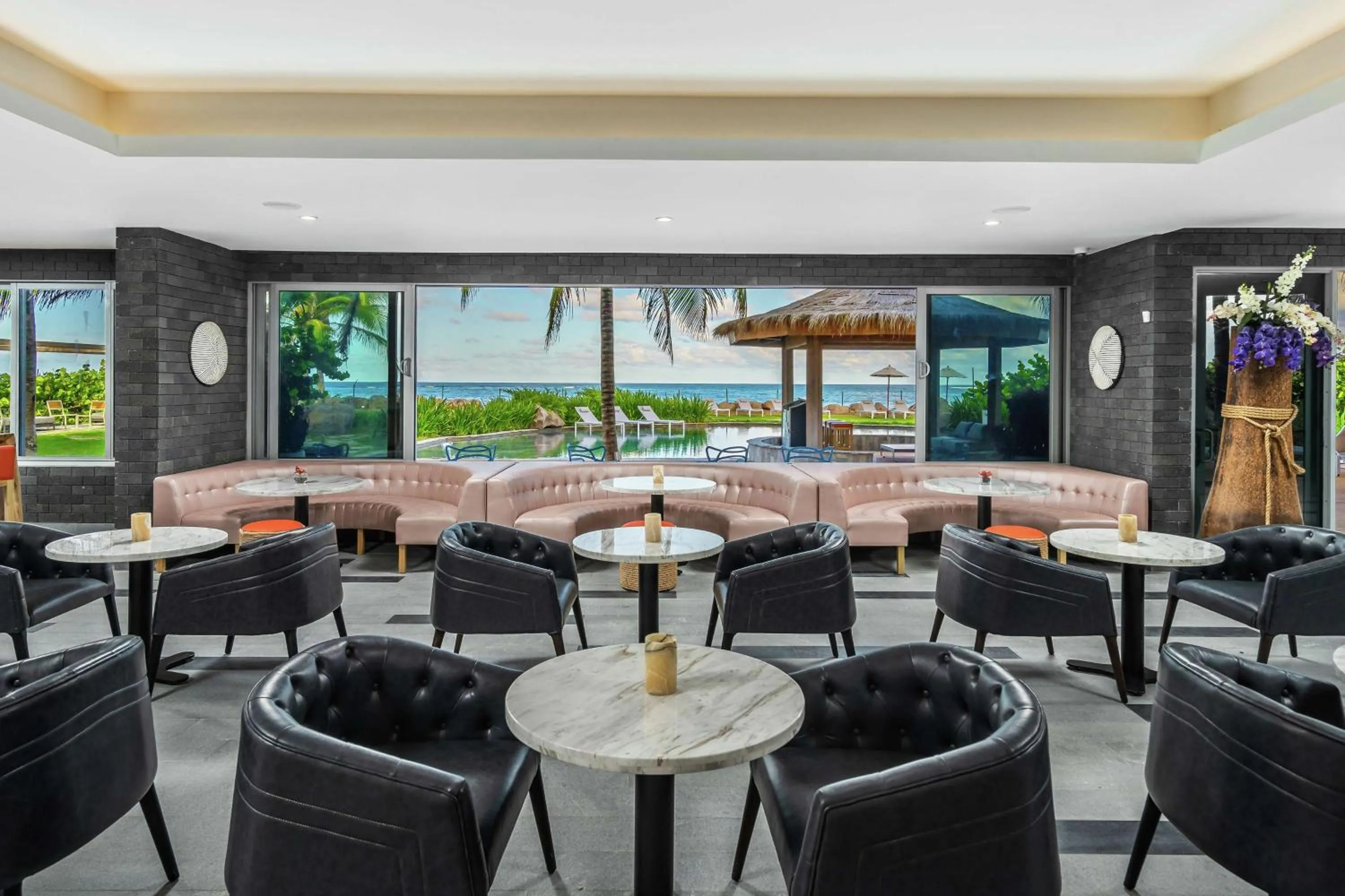 Dining area in Koi Resort Saint Kitts, Curio Collection by Hilton