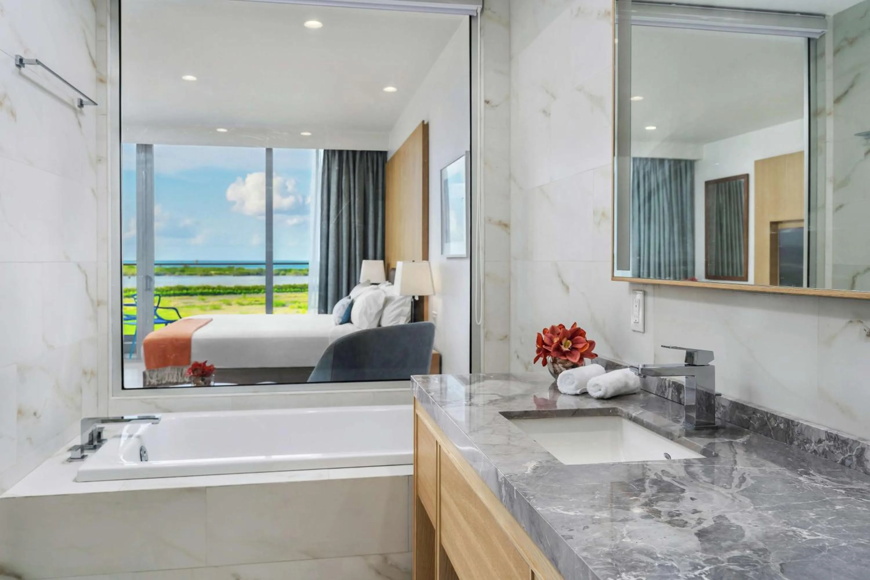 Bathroom, Bed in Koi Resort Saint Kitts, Curio Collection by Hilton