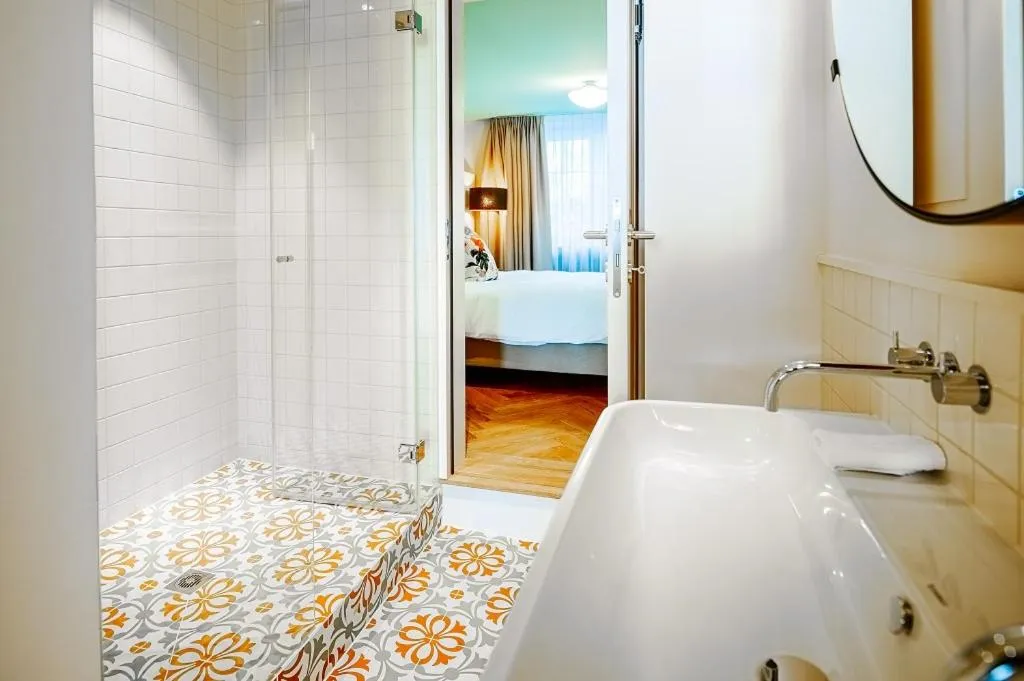 Shower, Bed in Luxury Residences by Widder Hotel