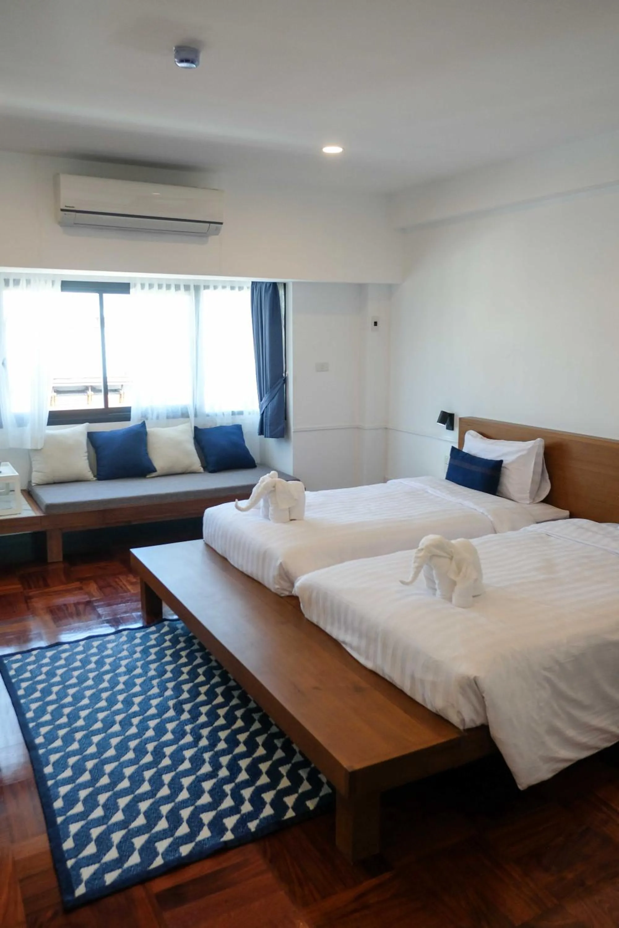 Photo of the whole room, Bed in The Chimes Chiangmai Old City