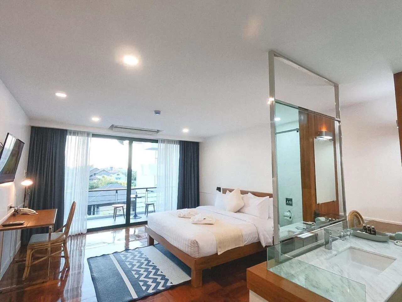 Photo of the whole room, Bed in The Chimes Chiangmai Old City