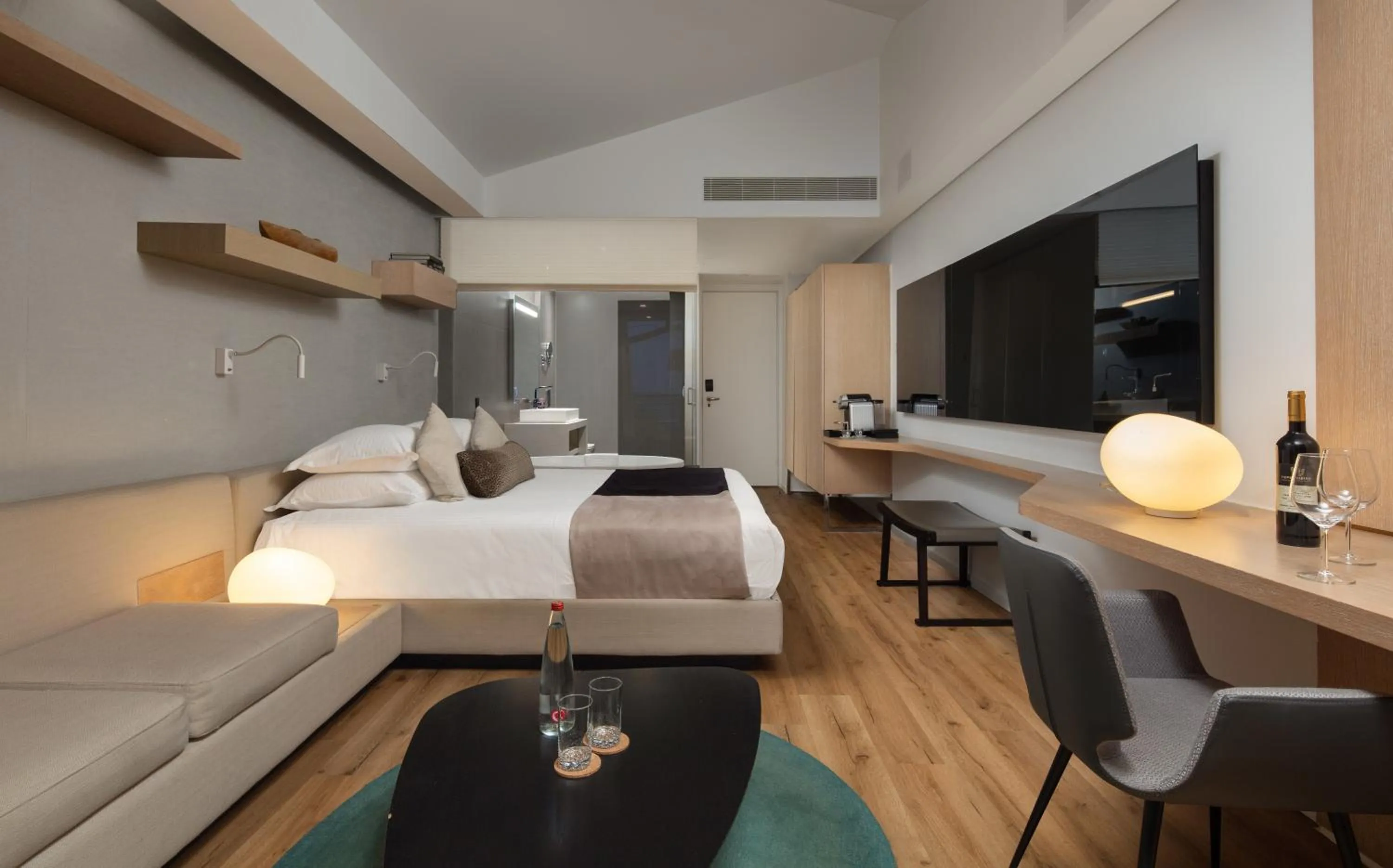 Living room, Bed in Cramim by Isrotel Exclusive