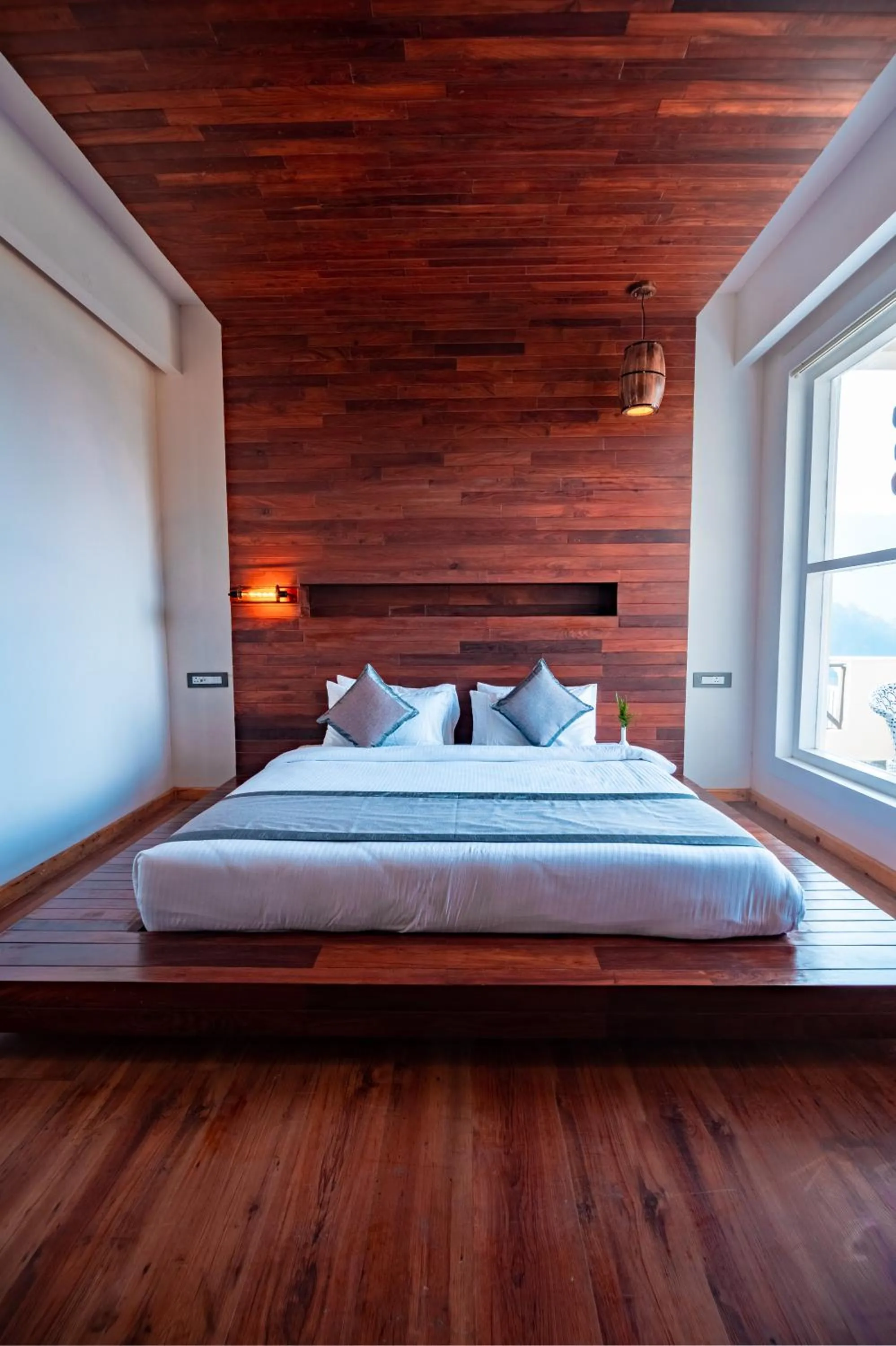 Bed in Clarks Exotica Resort Ramgarh Mukteshwar