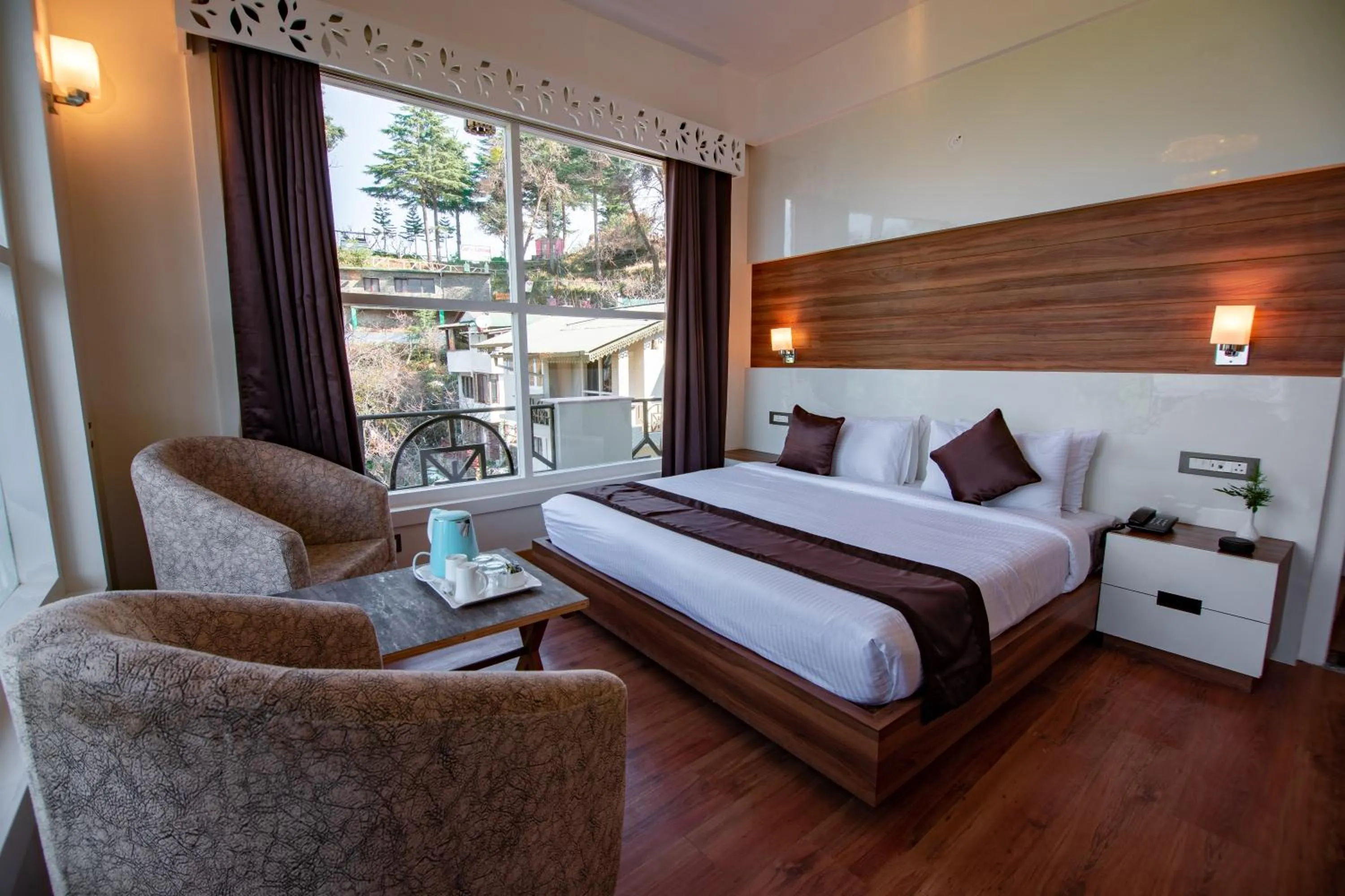 Photo of the whole room, Bed in Clarks Exotica Resort Ramgarh Mukteshwar
