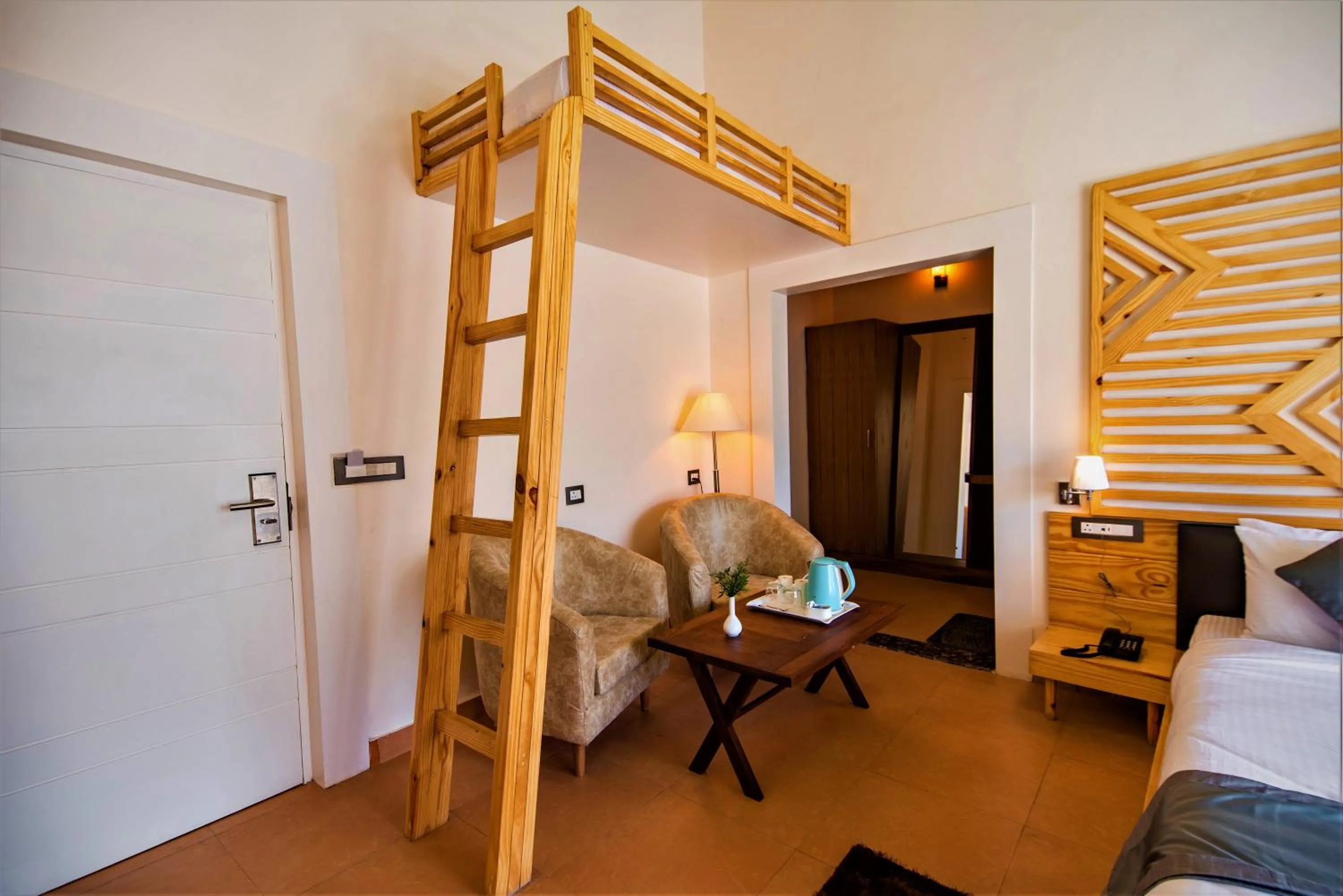 Bed in Clarks Exotica Resort Ramgarh Mukteshwar