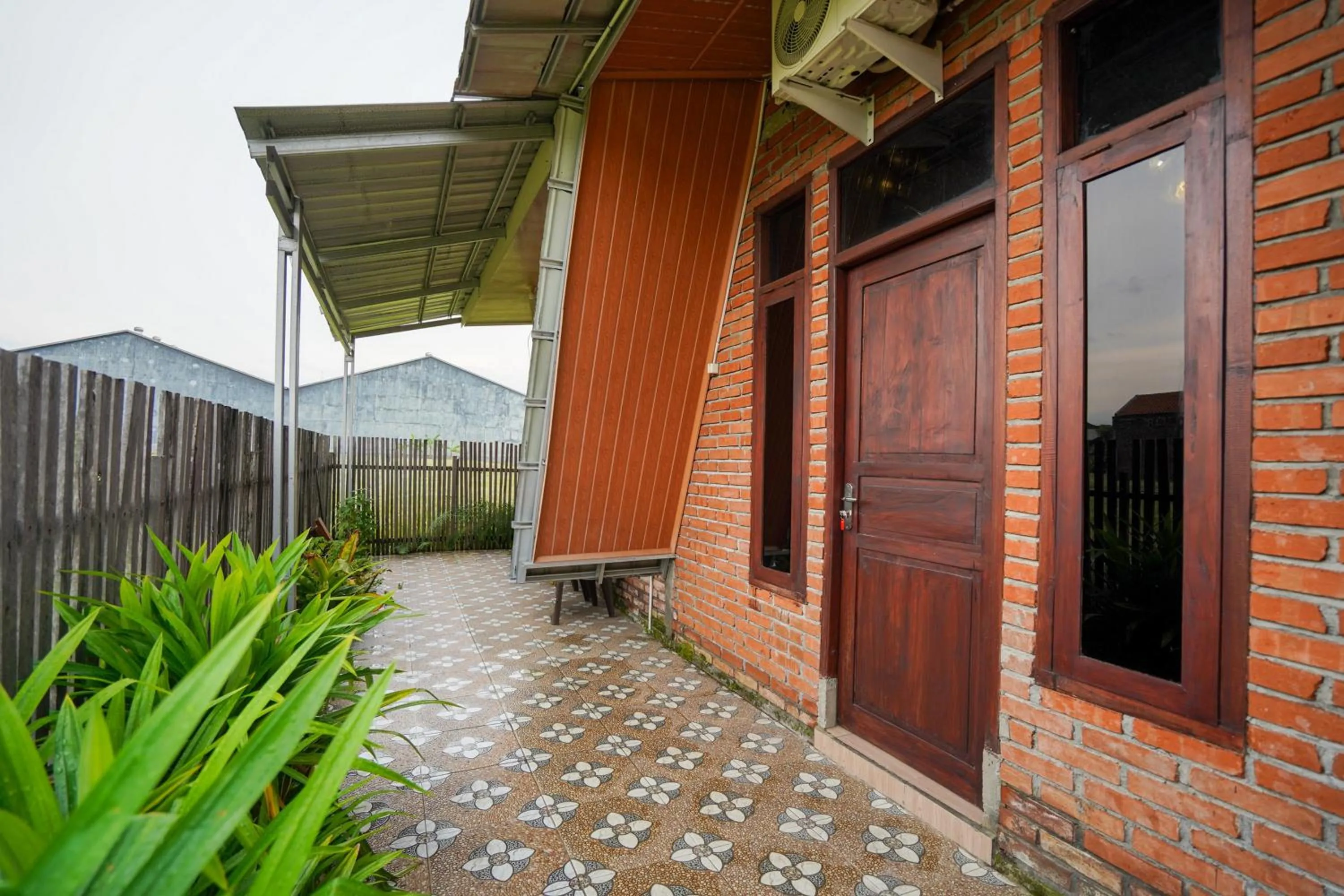 Property building in RedDoorz at Omah Kayu Homestay Yogyakarta