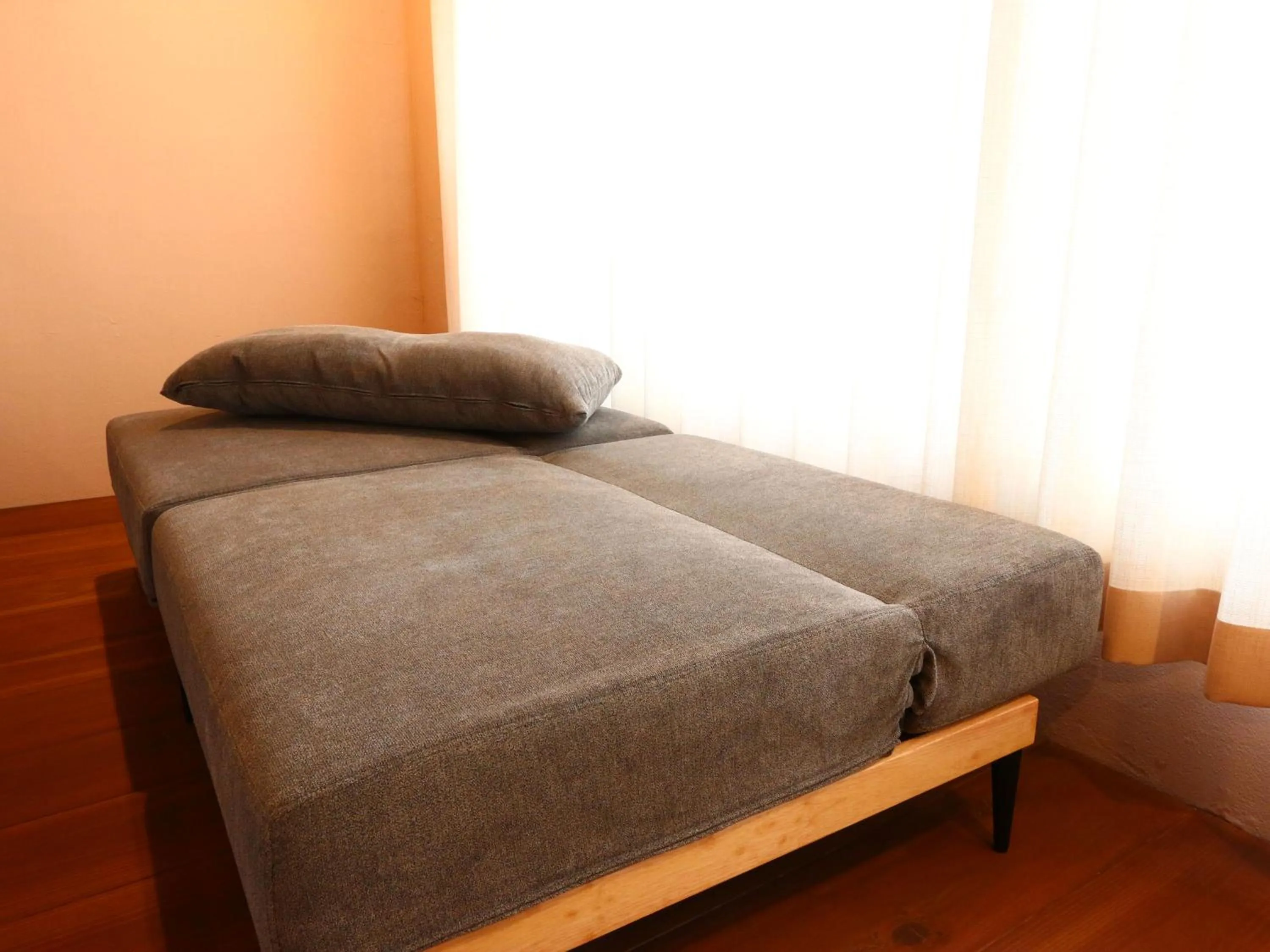 Bed in nirasakiyaSTAY