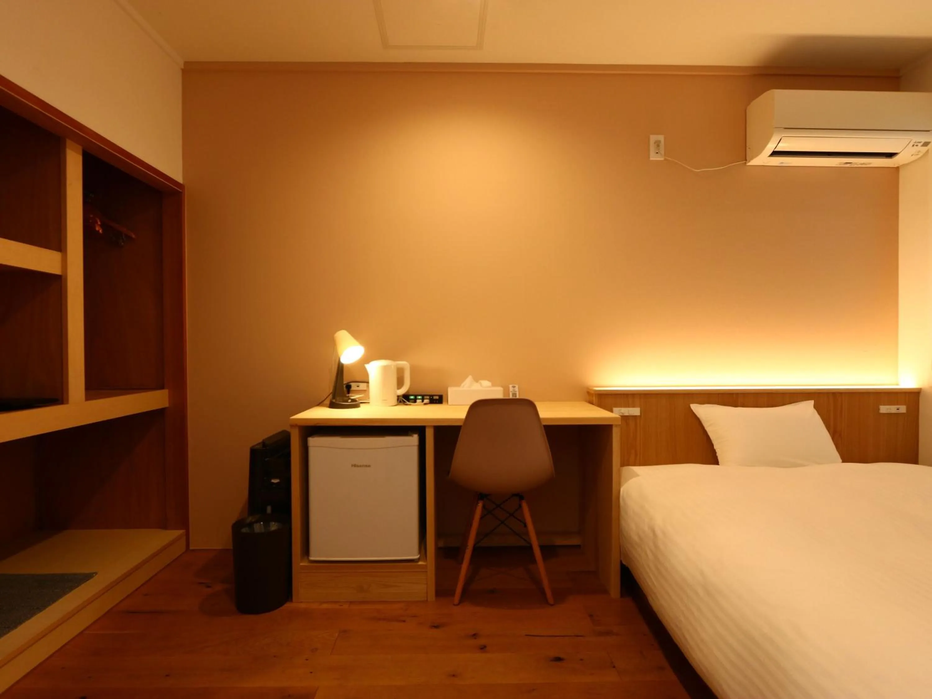 Bed in nirasakiyaSTAY