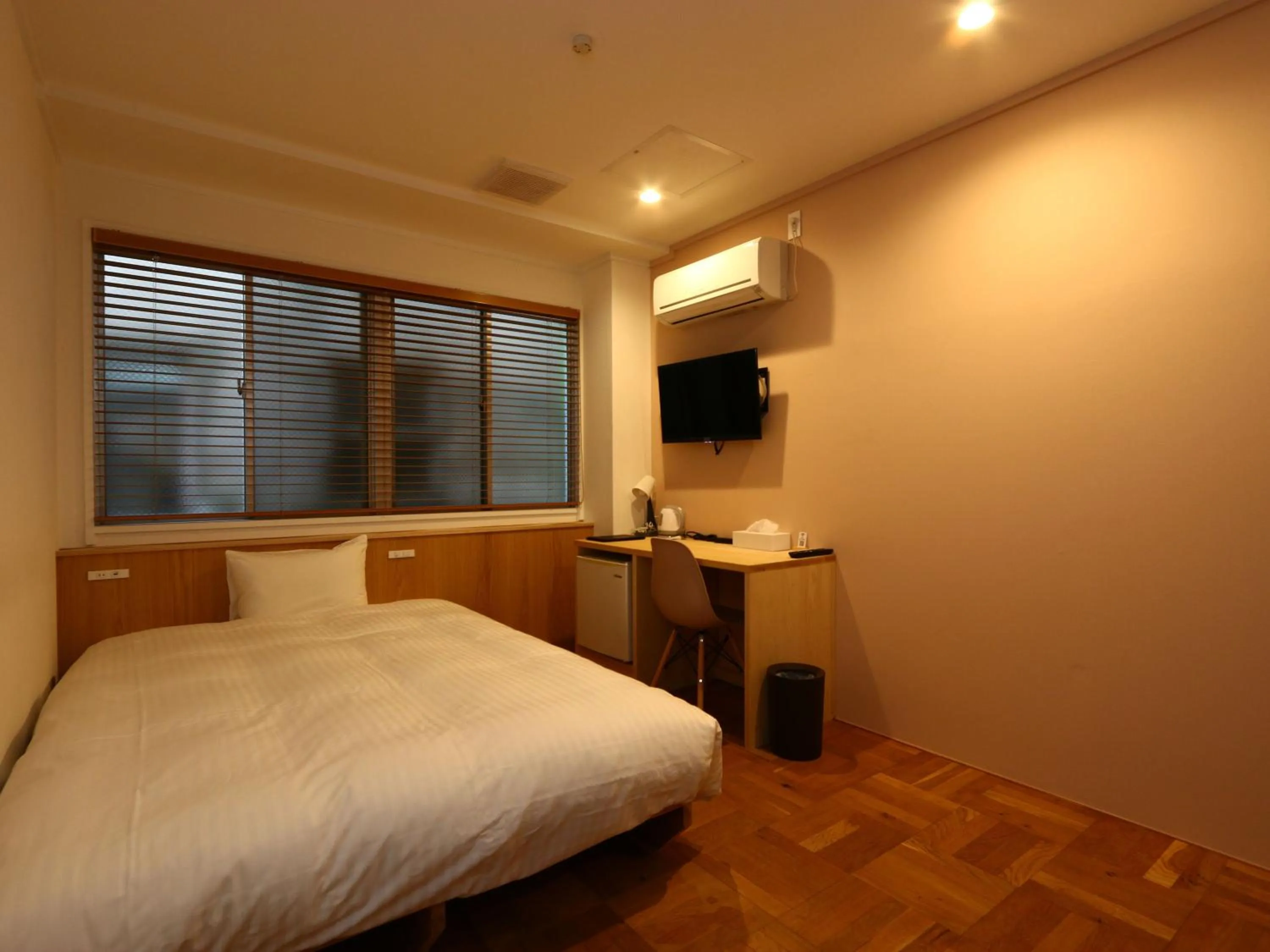 Bed in nirasakiyaSTAY