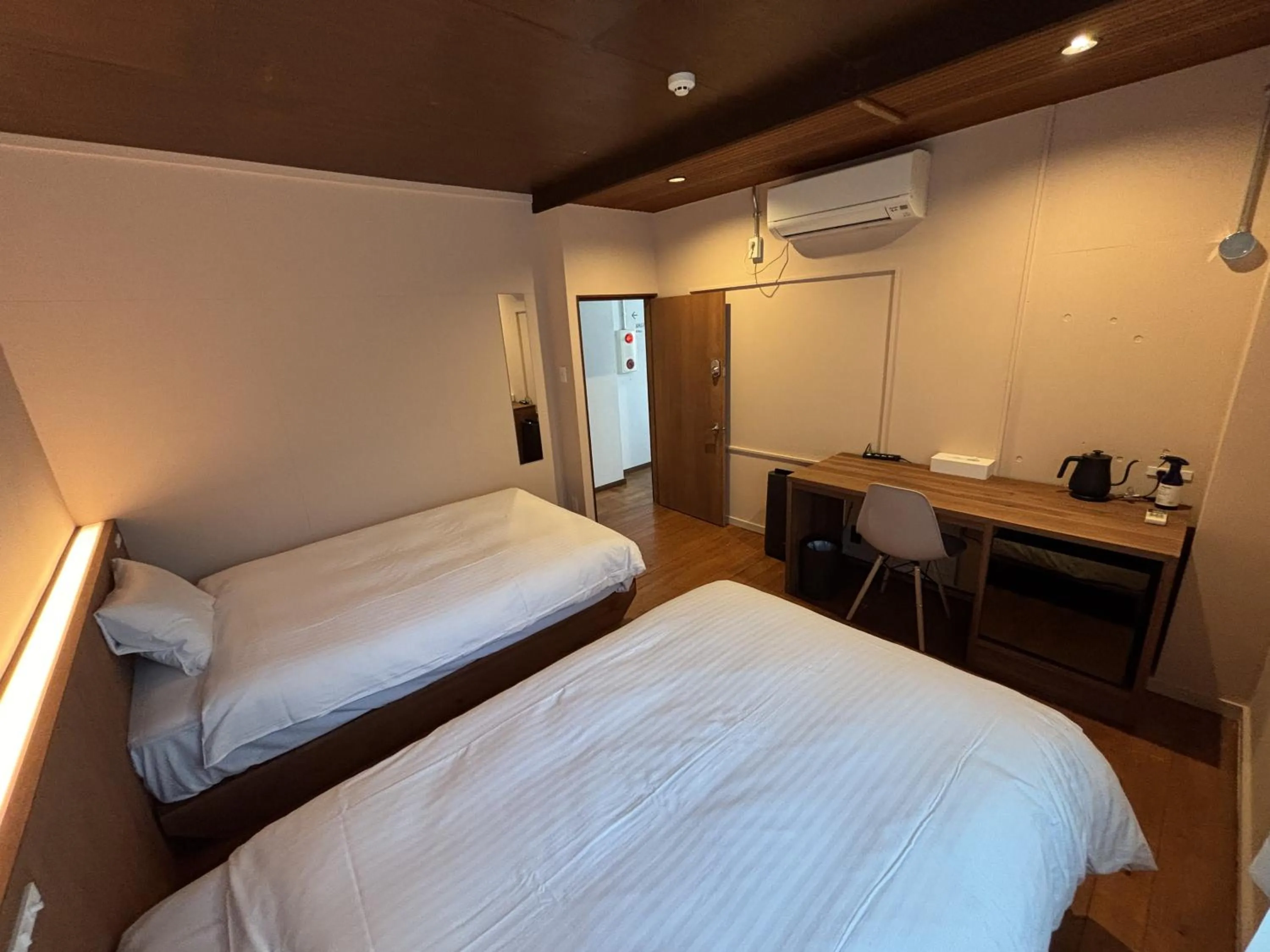 Bed in nirasakiyaSTAY