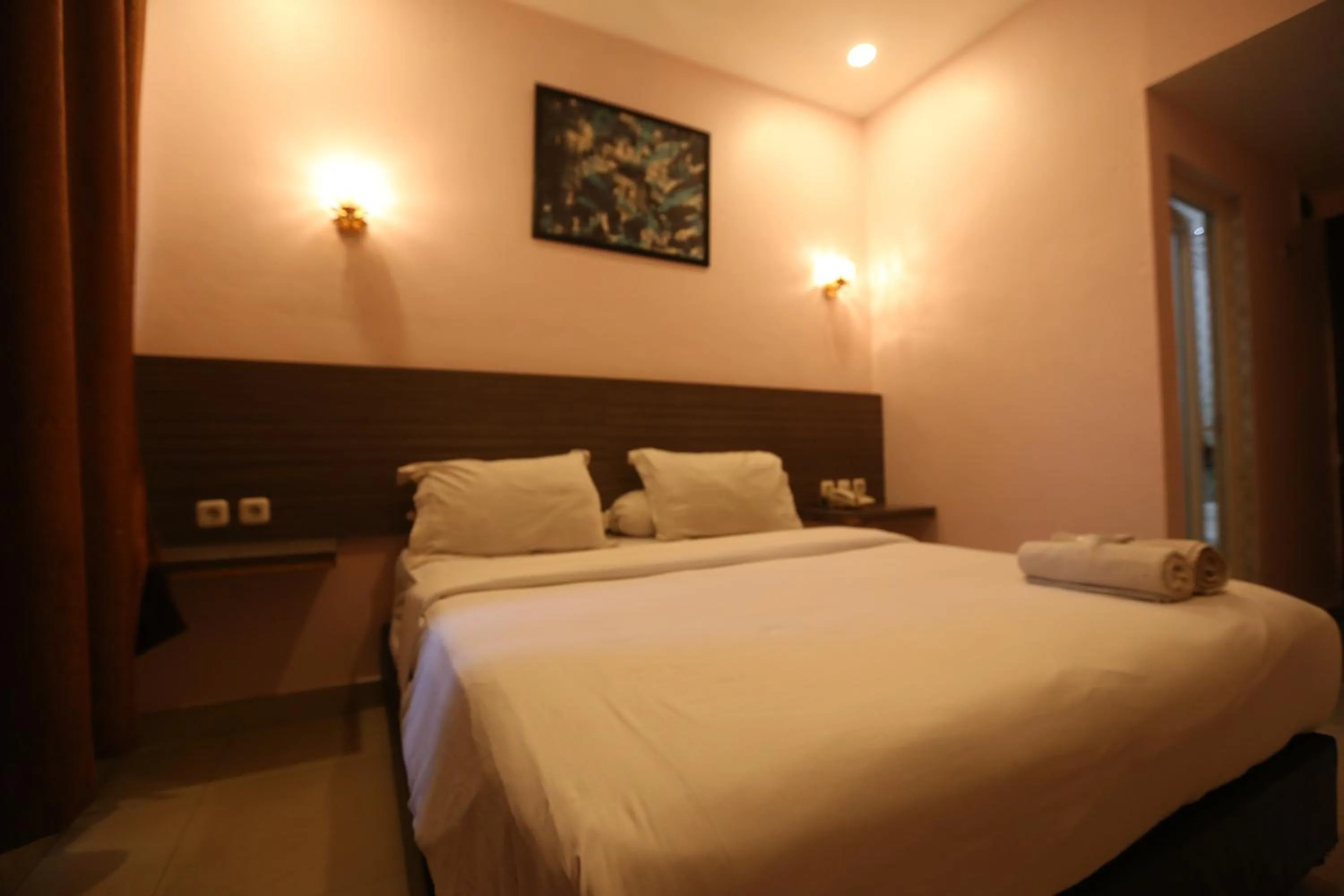 Bed in De'Tonga Hotel