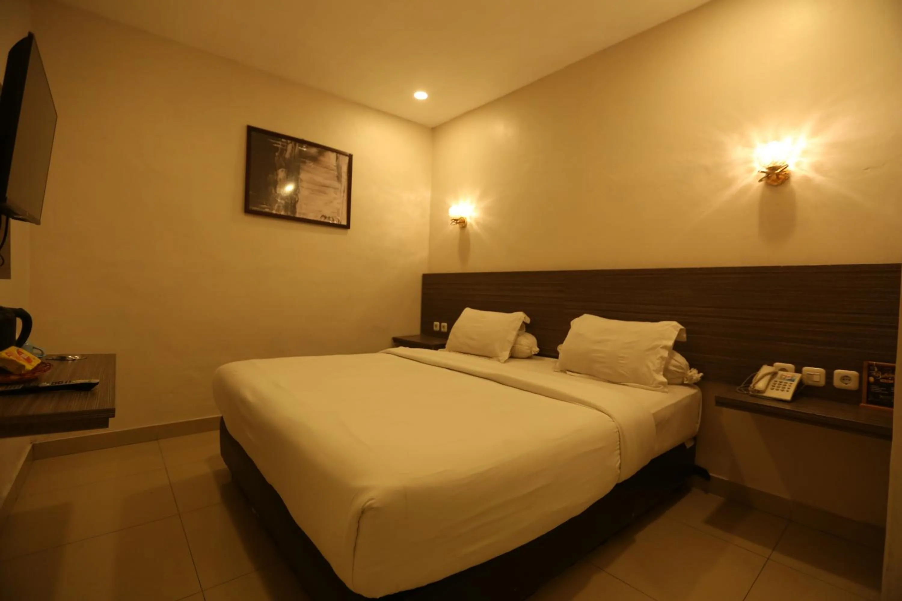 Bed in De'Tonga Hotel