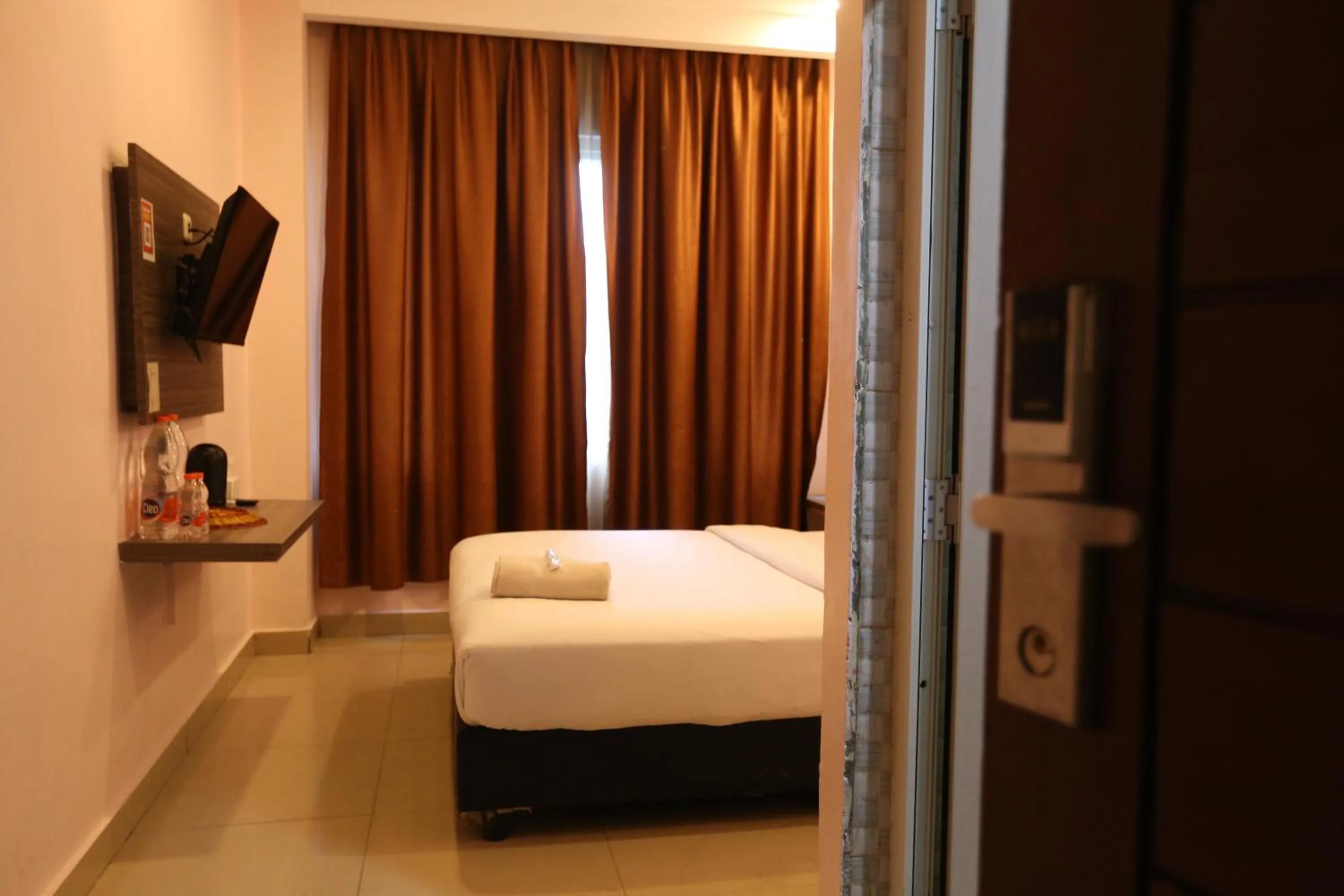 Bed in De'Tonga Hotel