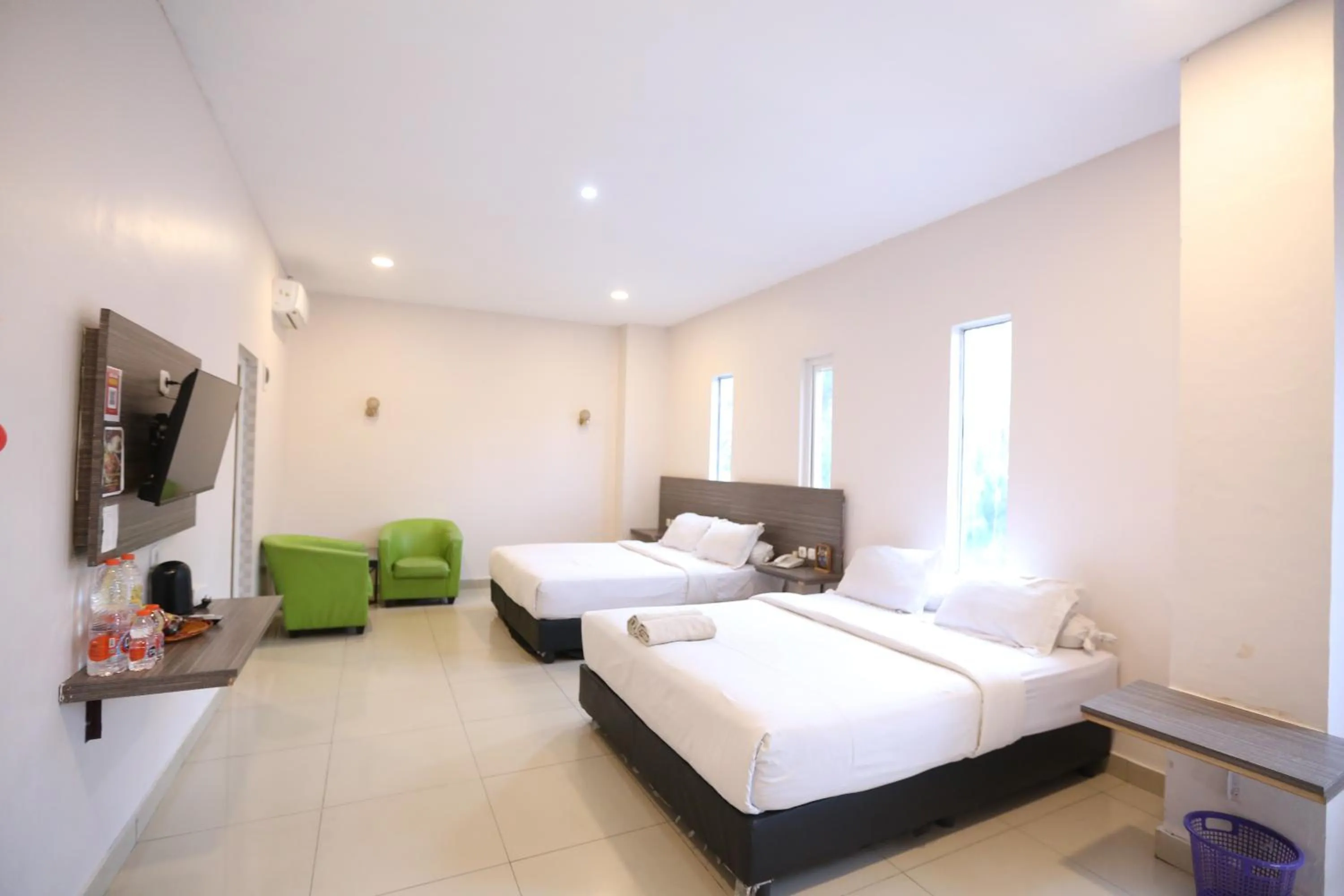 Bed in De'Tonga Hotel