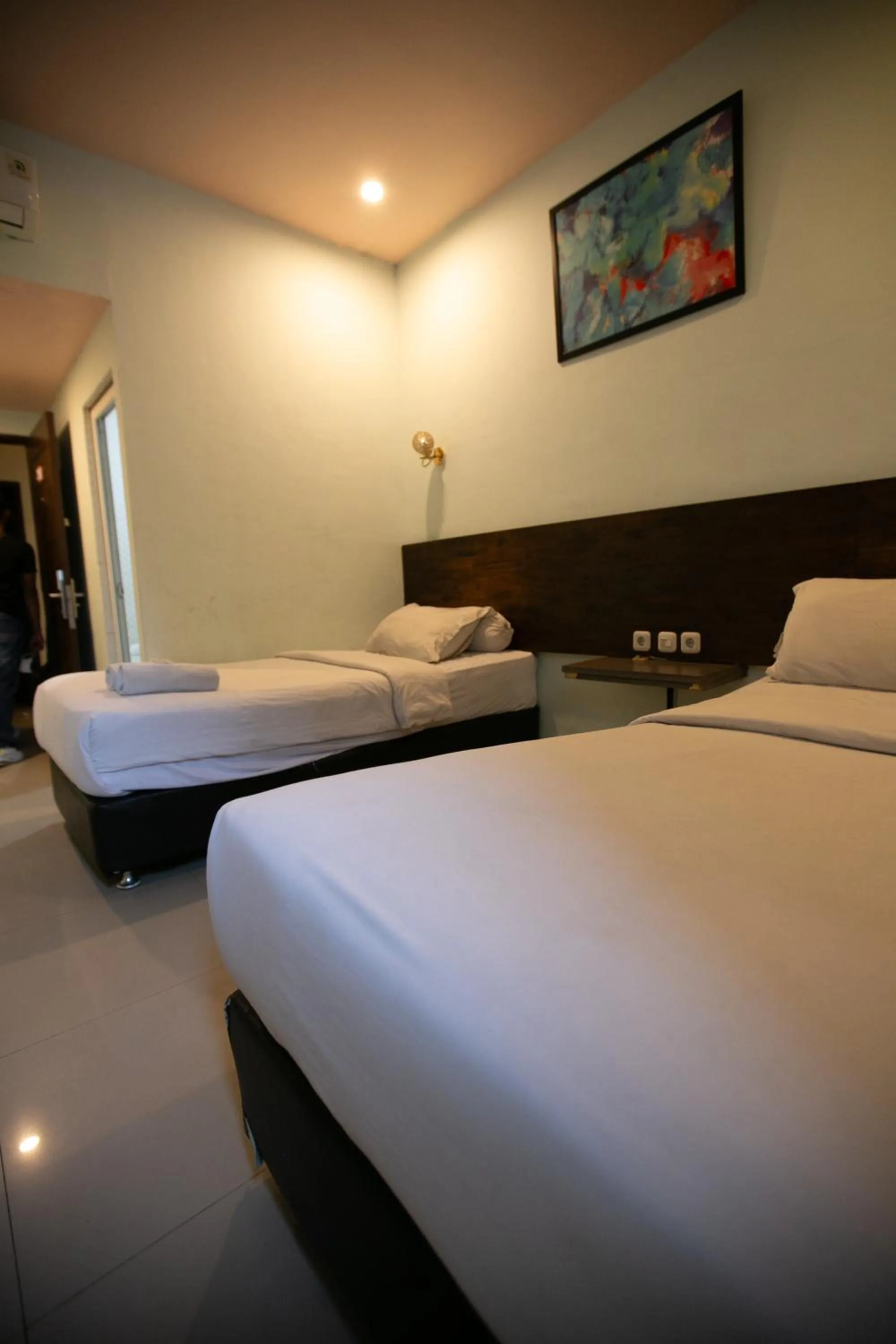 Bed in De'Tonga Hotel