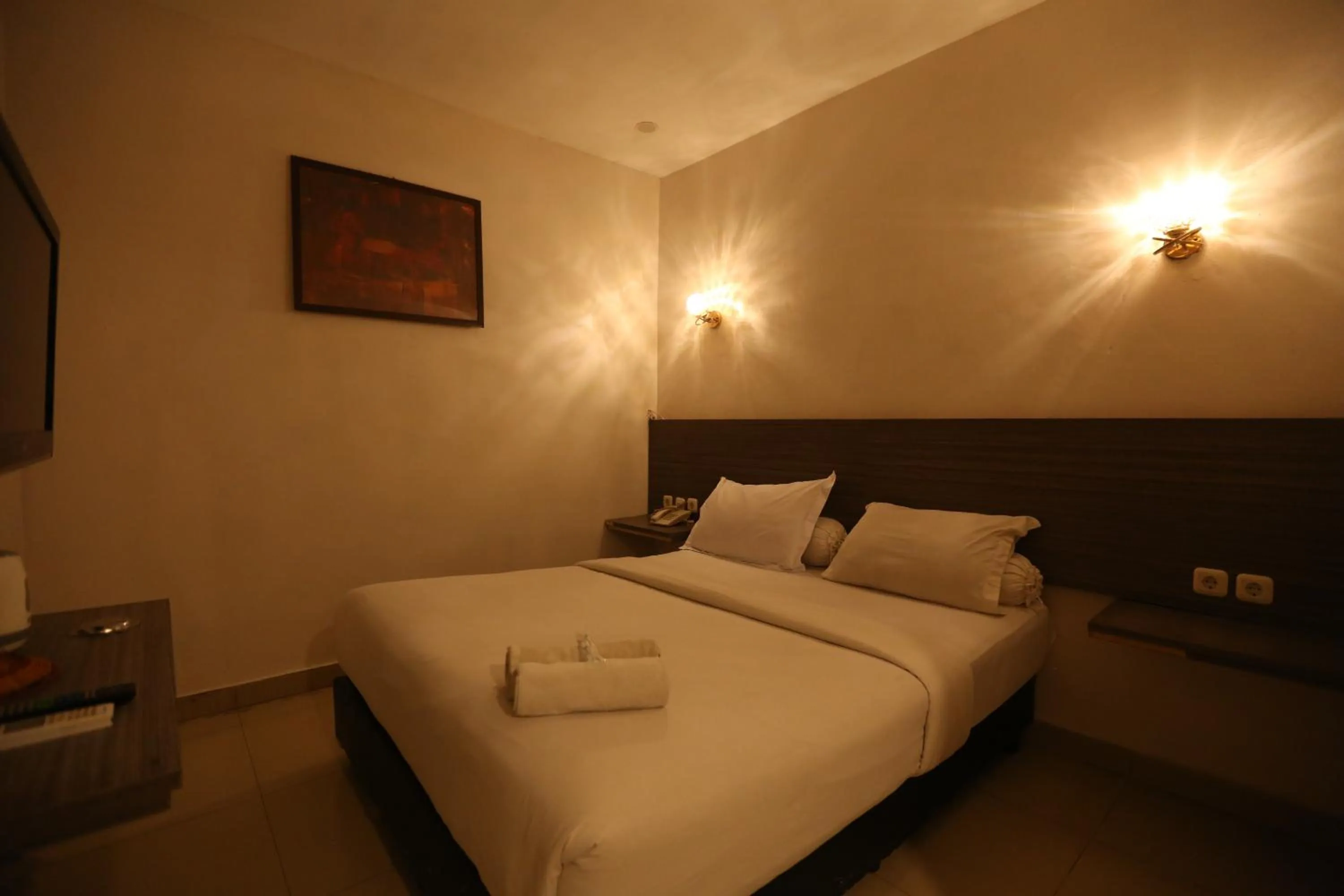 Bed in De'Tonga Hotel