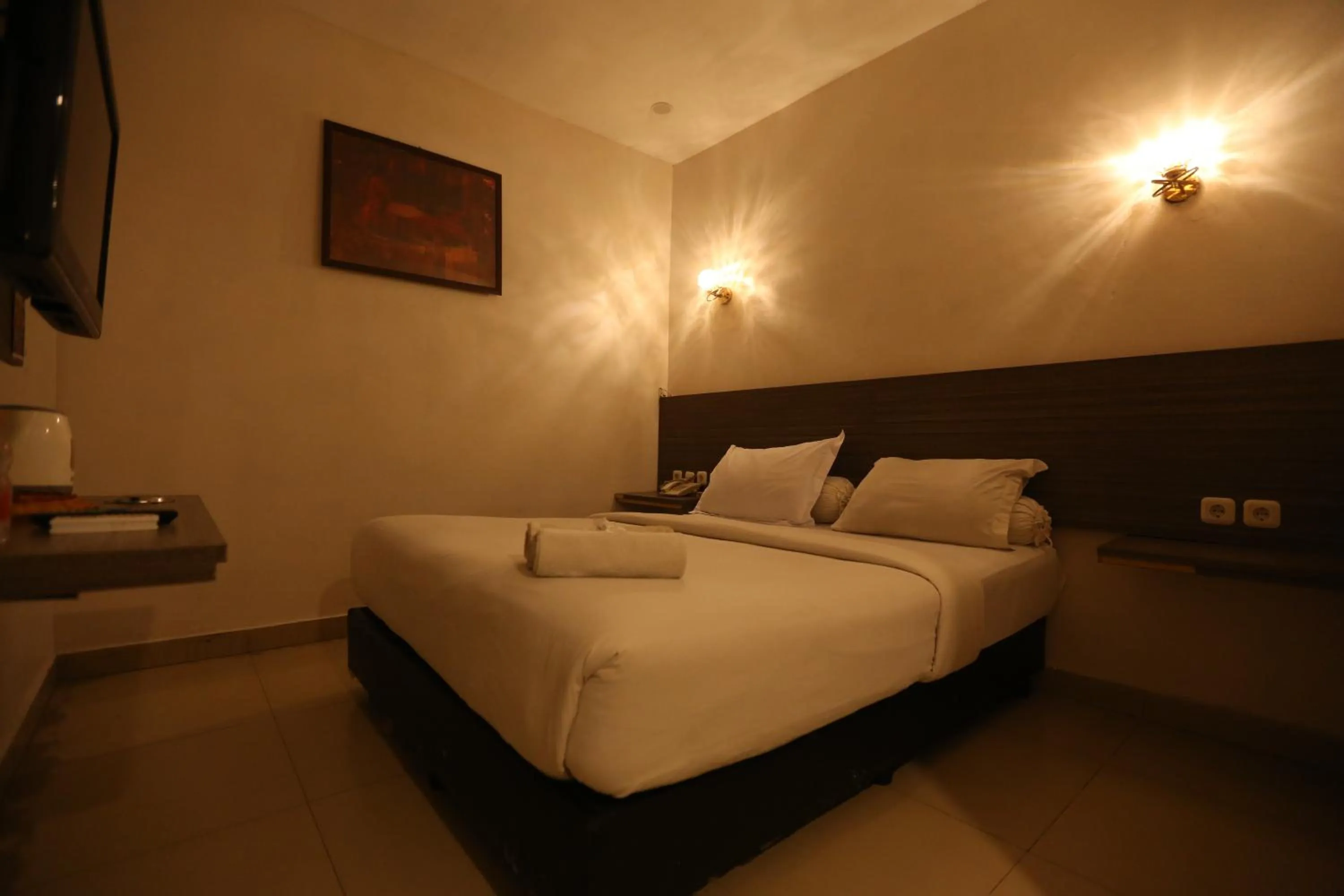 Bed in De'Tonga Hotel