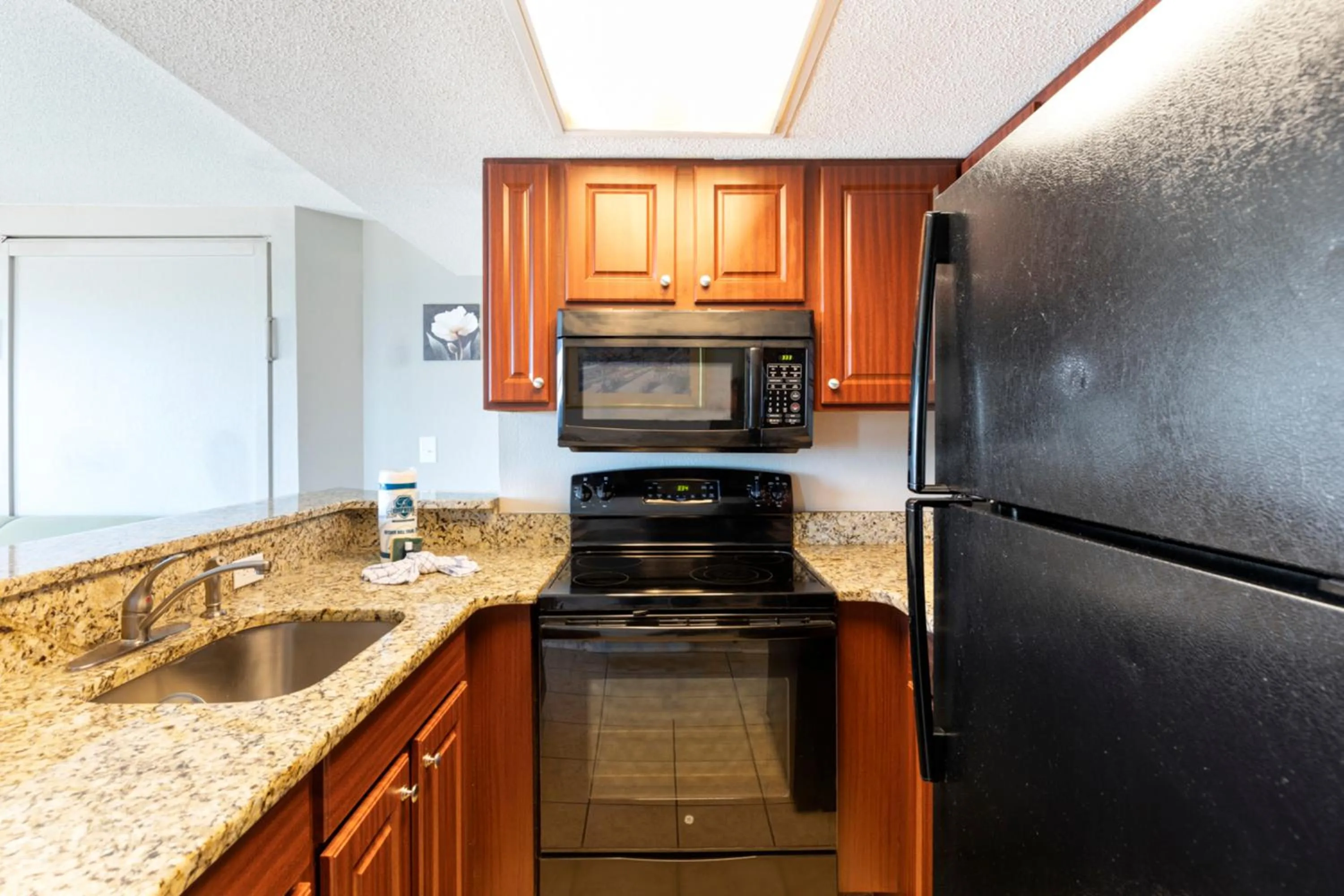 Kitchen or kitchenette in Ocean-Front Condos at Patricia Grand