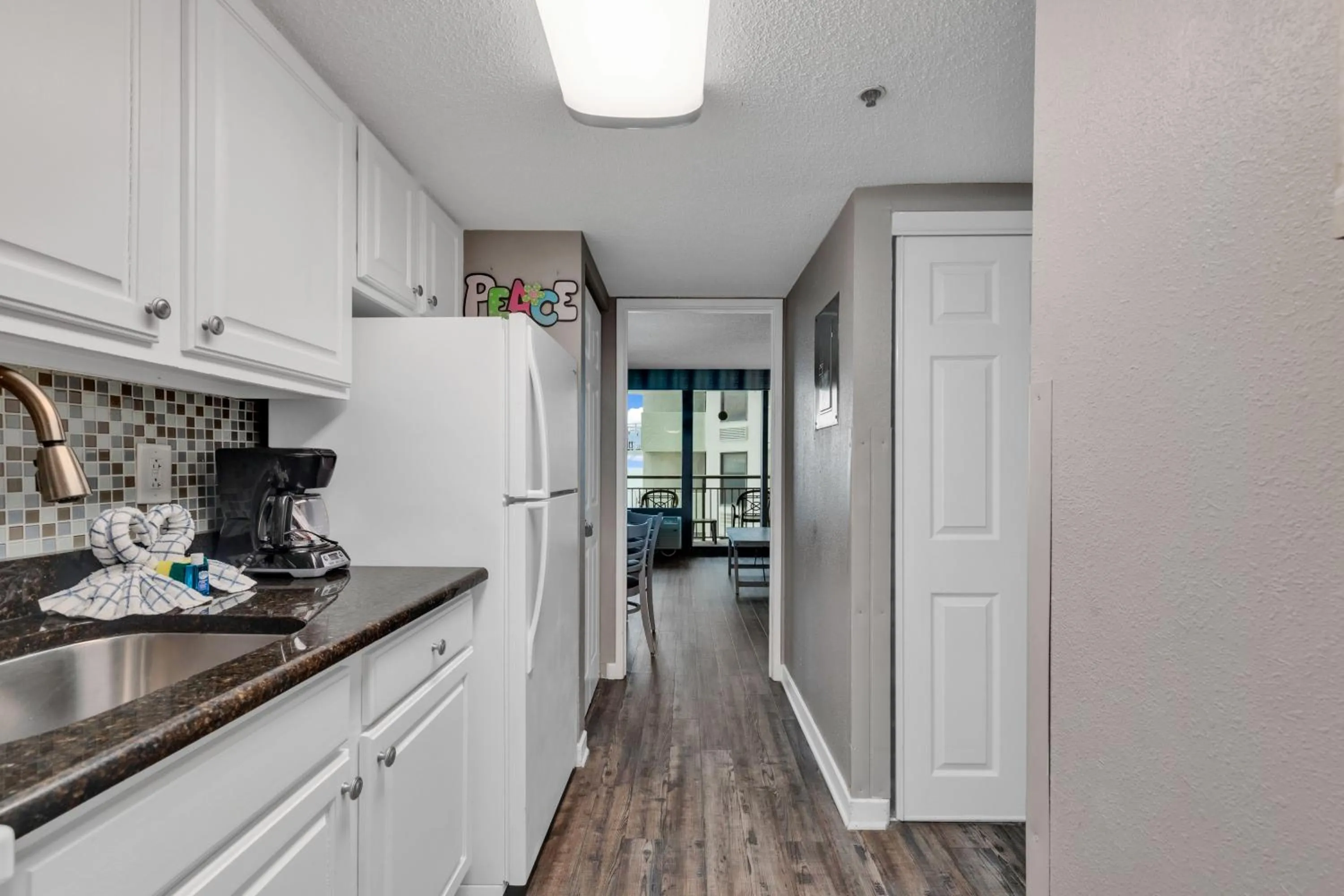 Kitchen or kitchenette in Ocean-Front Condos at Patricia Grand