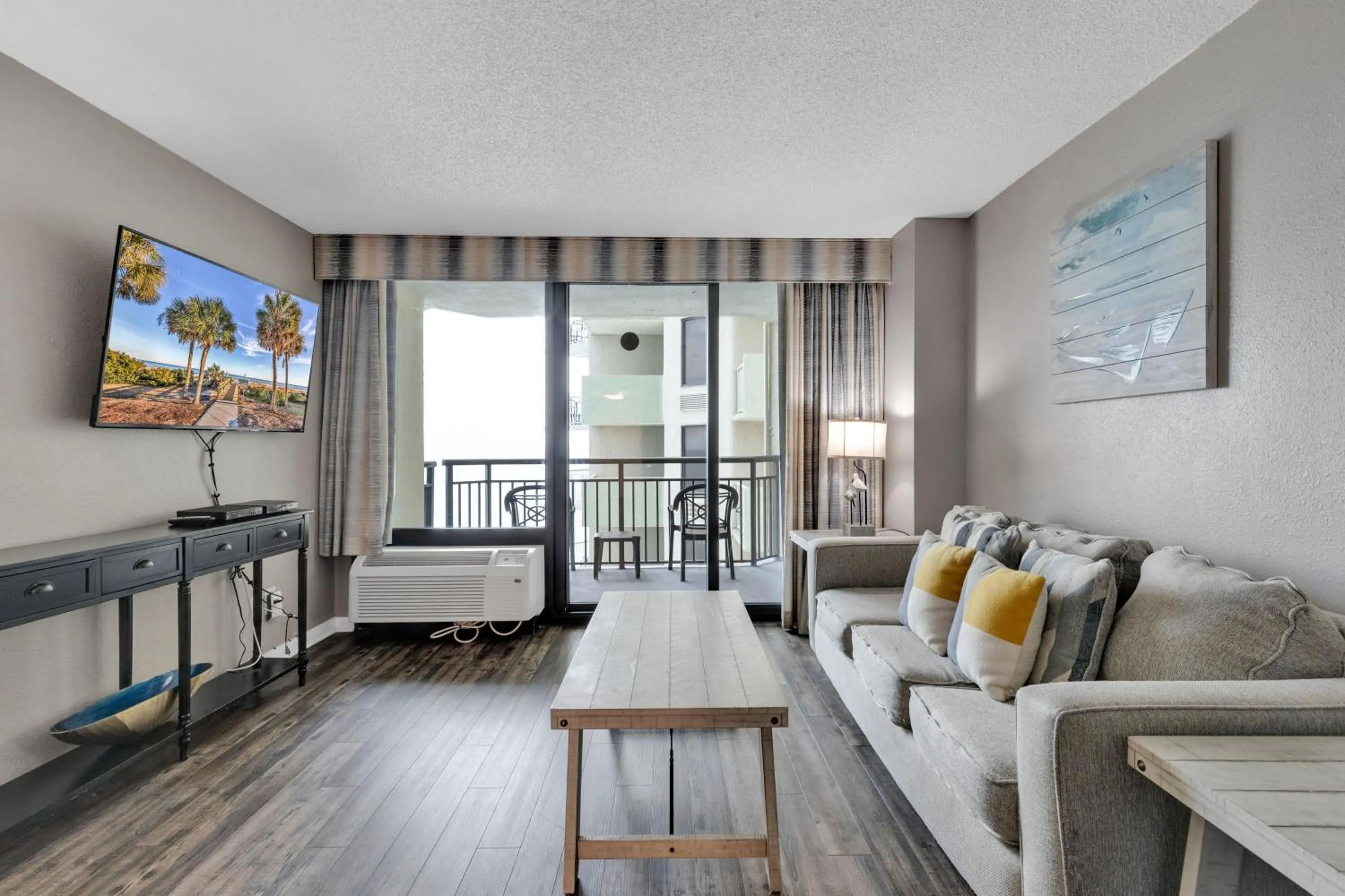 Living room, Bed in Ocean-Front Condos at Patricia Grand