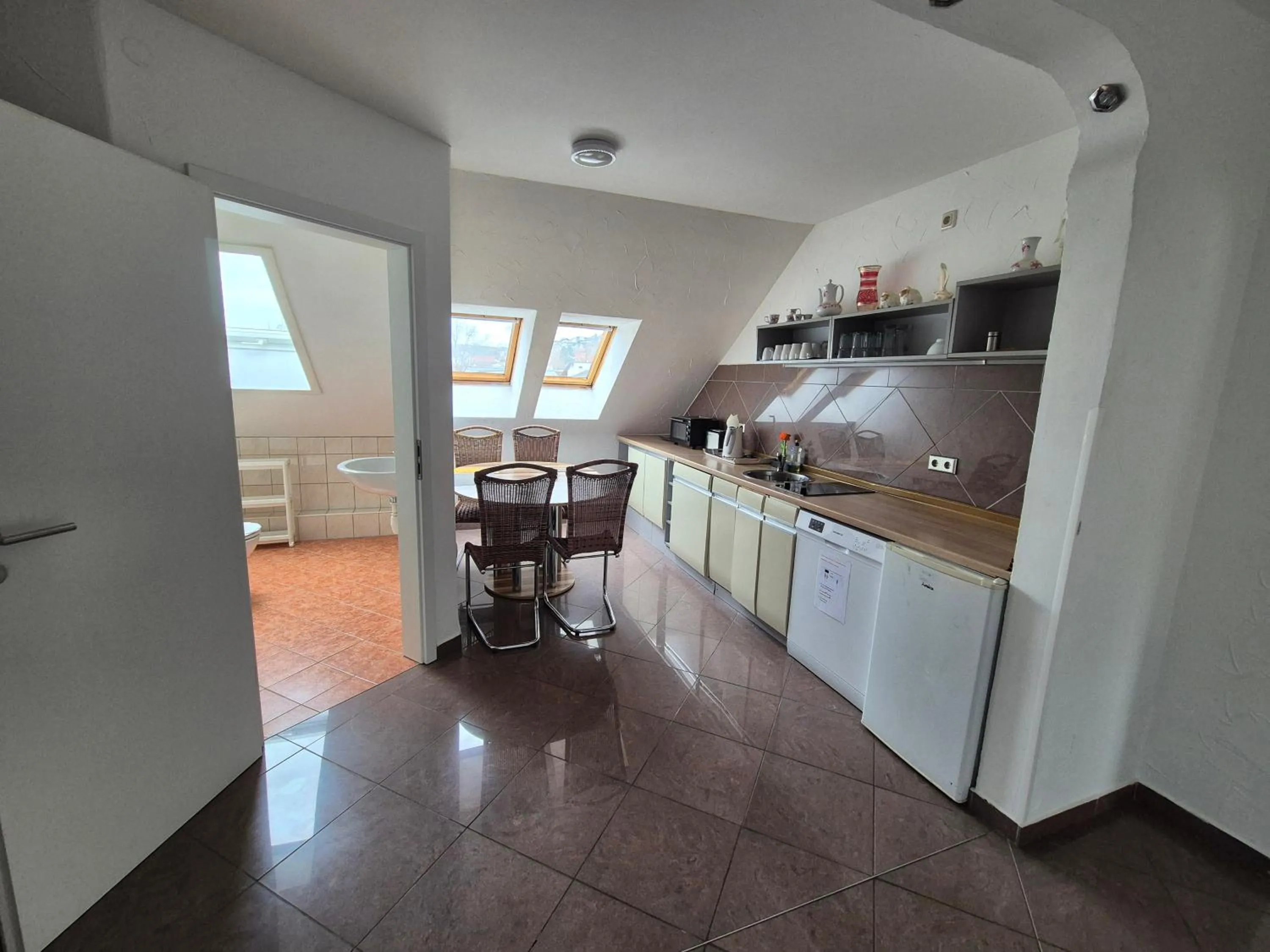 Kitchen or kitchenette in Mainstern Hotel