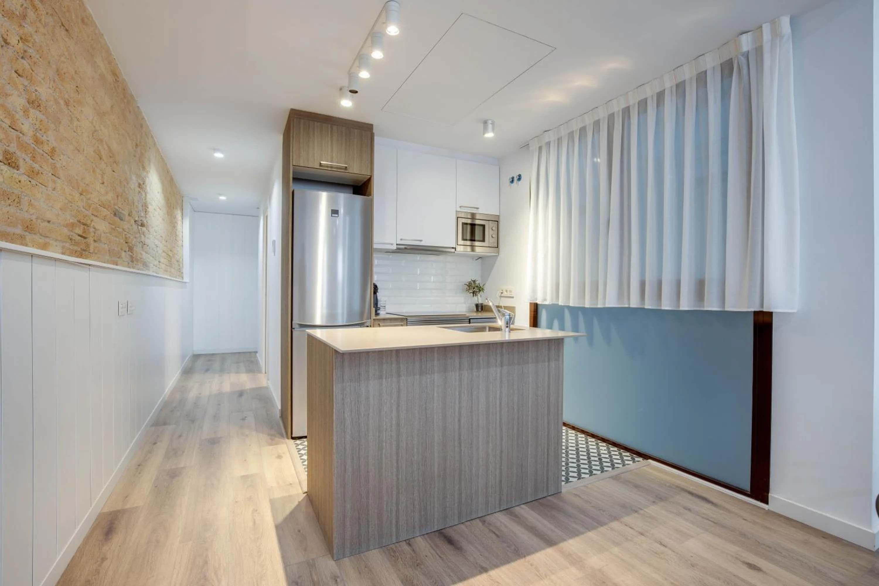 Kitchen or kitchenette in LucasLand Apartments Barcelona