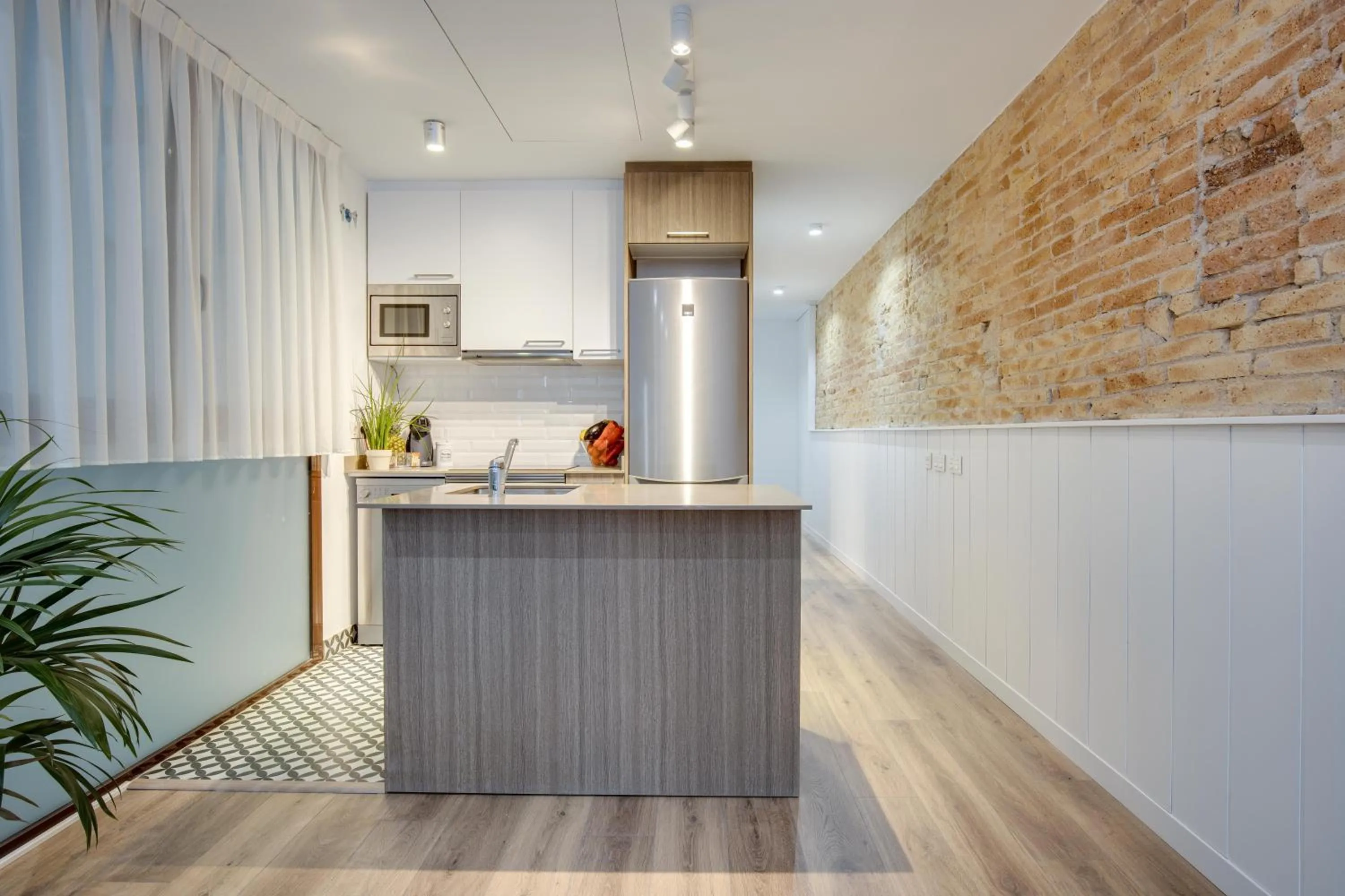 Kitchen or kitchenette in LucasLand Apartments Barcelona